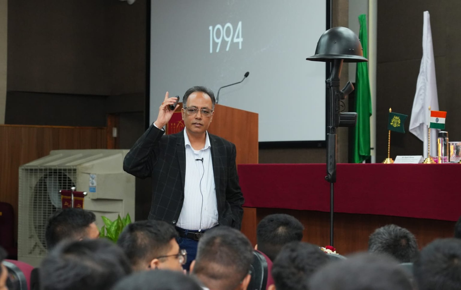 an abstract photo of a curved building with a blue sky in the background