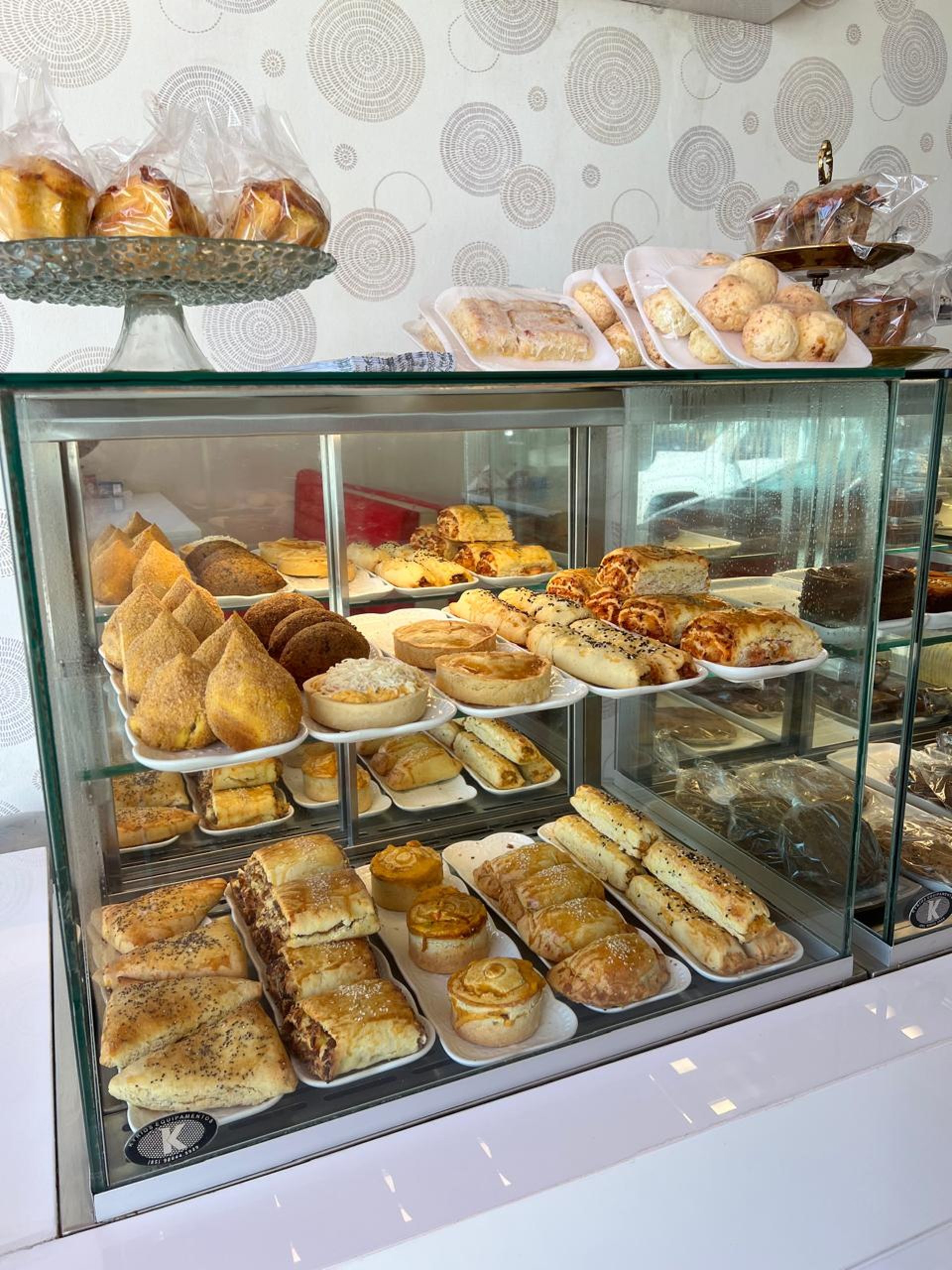 woman wearing yellow long-sleeved dress under white clouds and blue sky during daytime