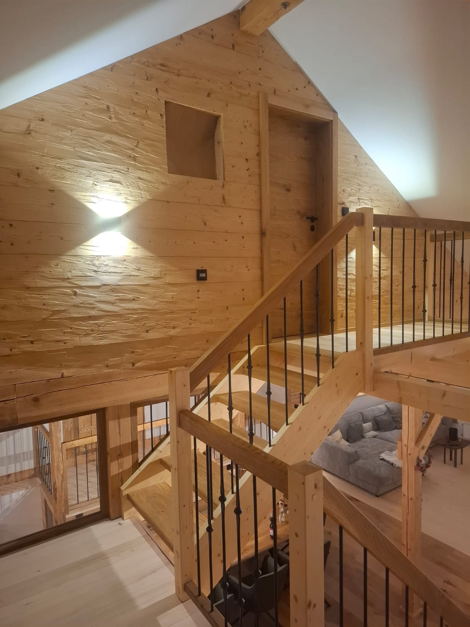 black and brown leather padded tub sofa