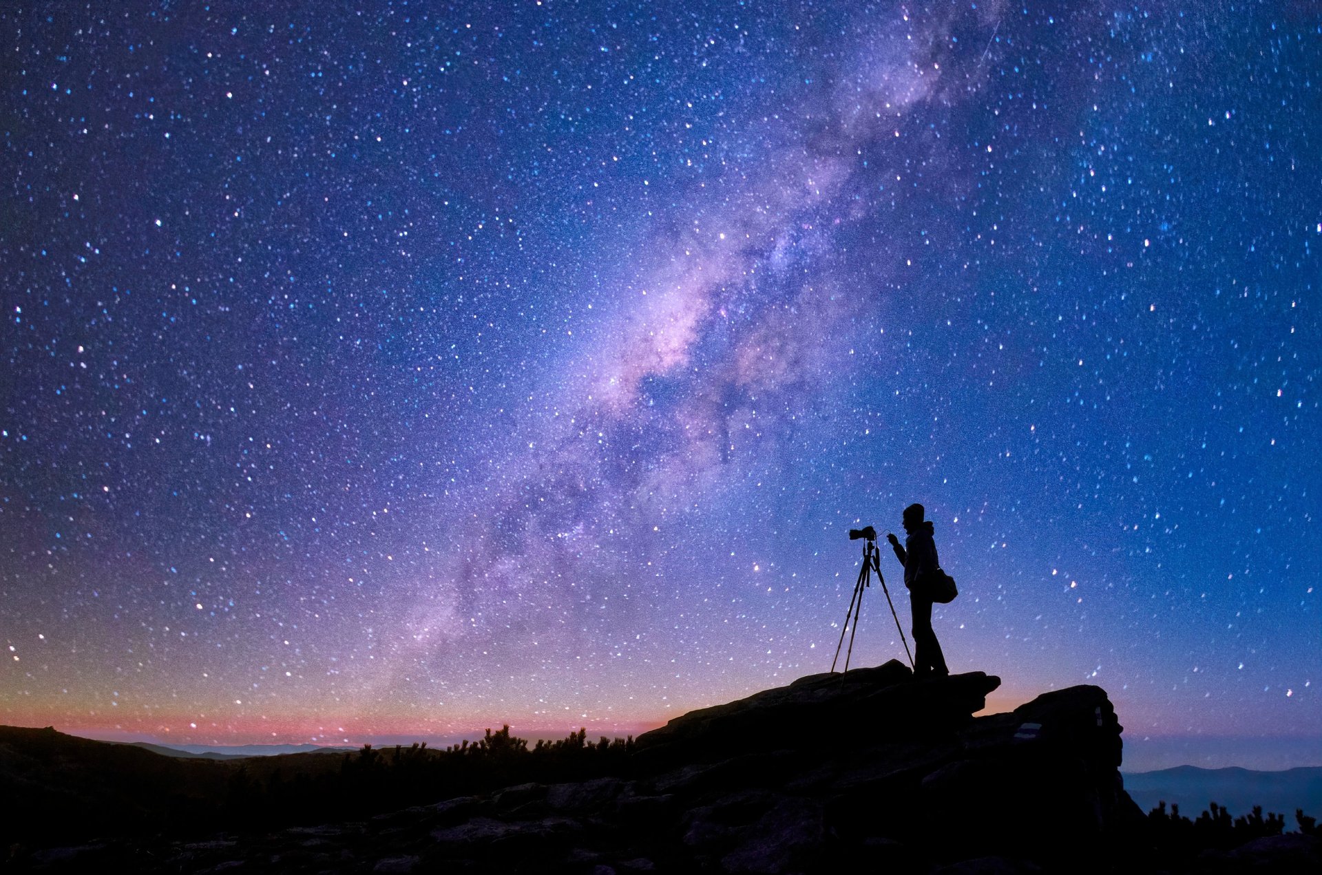 silhouette of mountain peak at nighttime