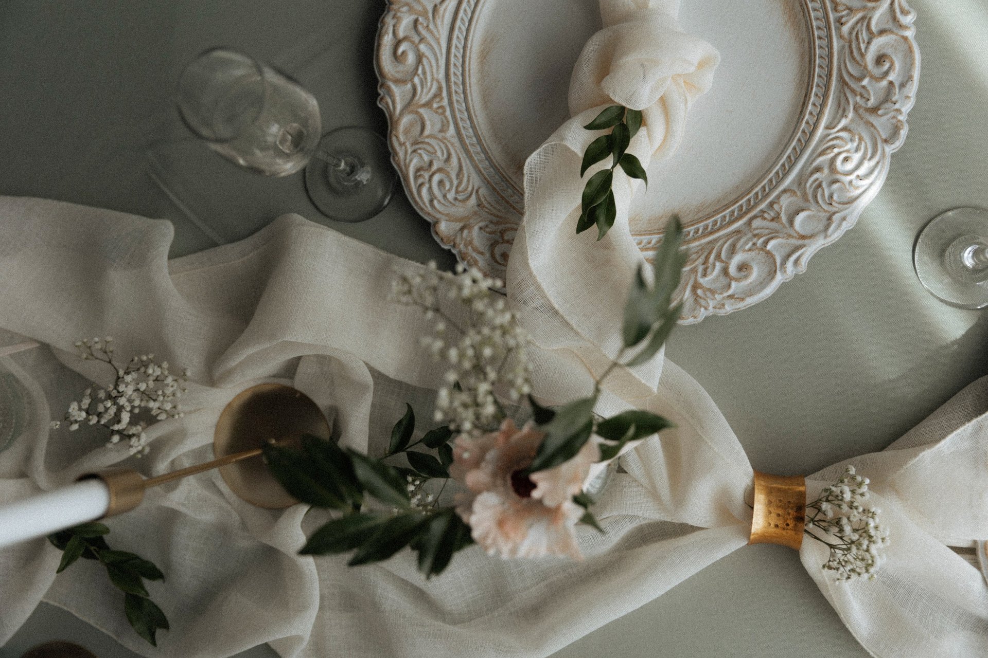 woman in white wedding dress standing near window during daytime