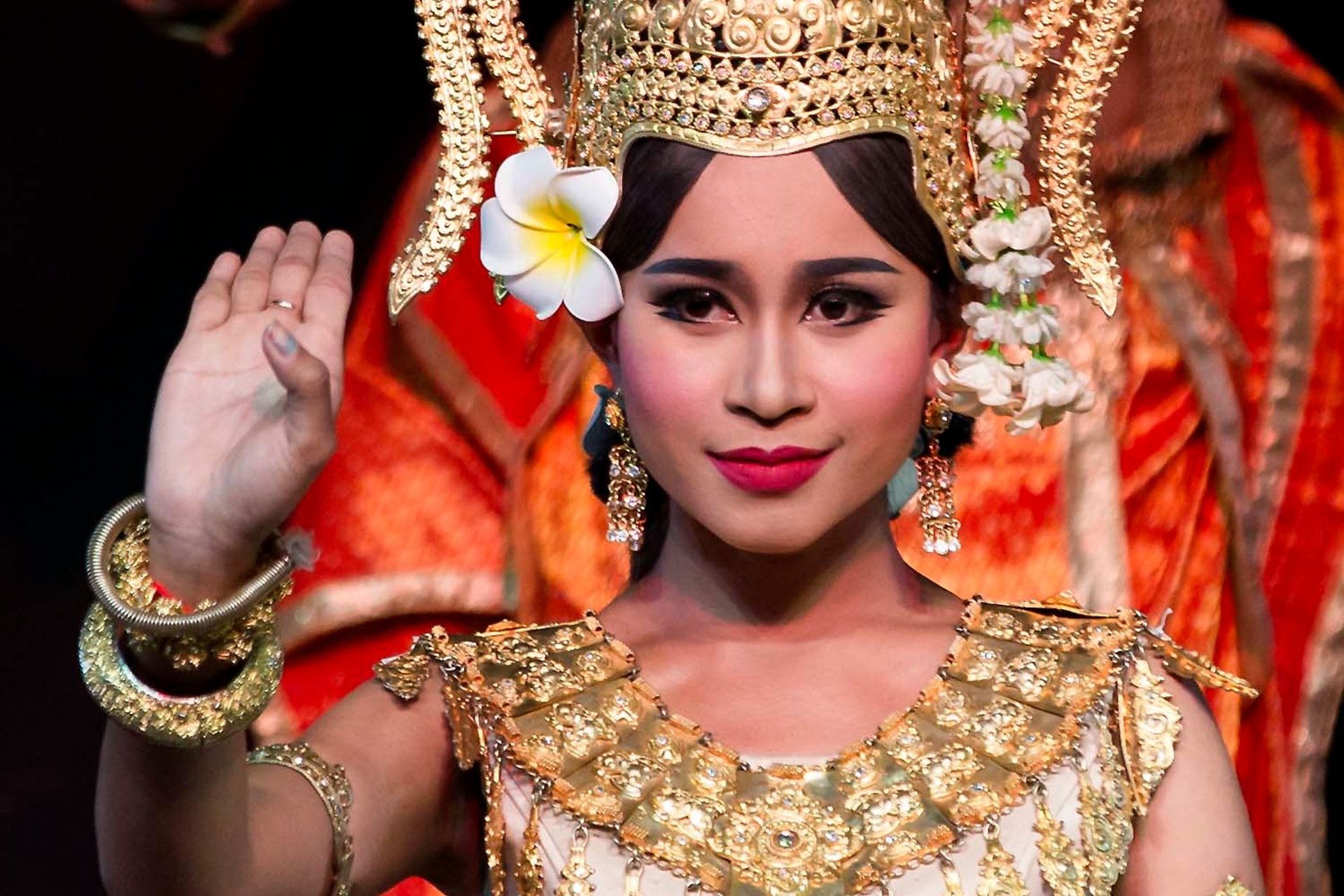 an abstract photo of a curved building with a blue sky in the background