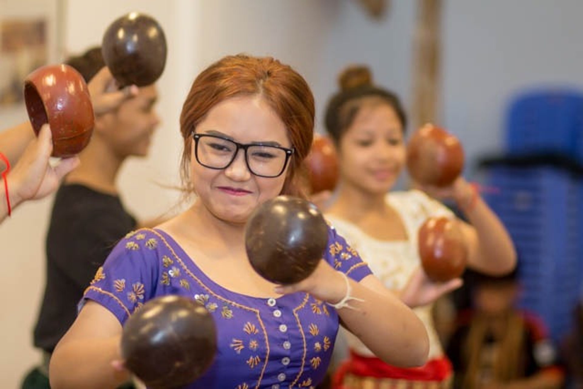 an abstract photo of a curved building with a blue sky in the background