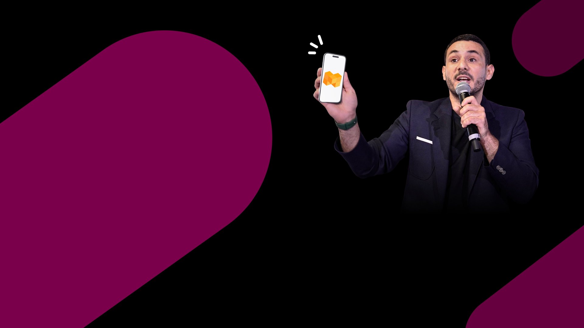 Speaker presenting on stage with audience watching