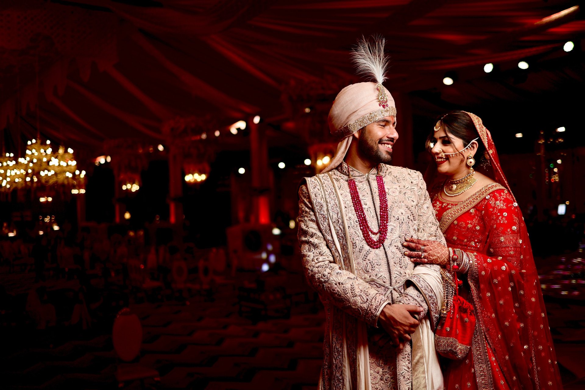 couple wearing silver-colored rings