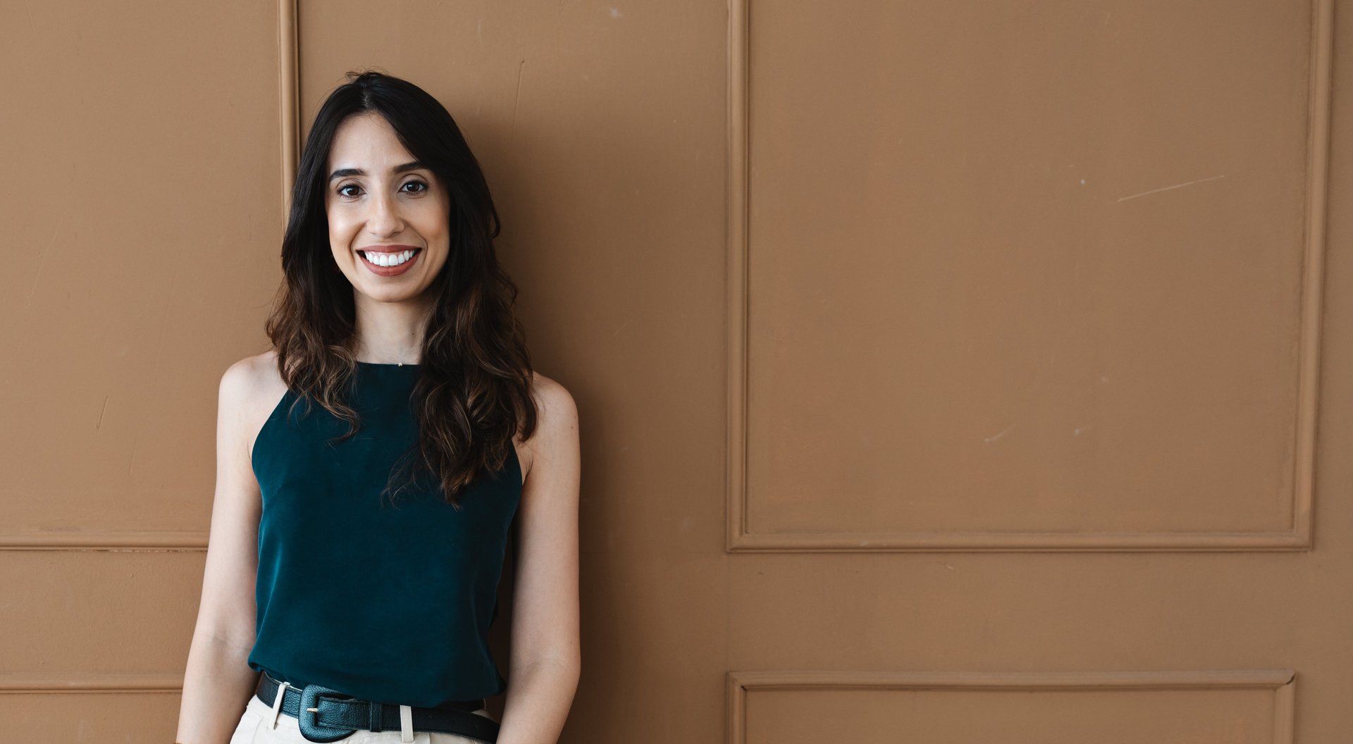 a close up of a black and brown abstract painting