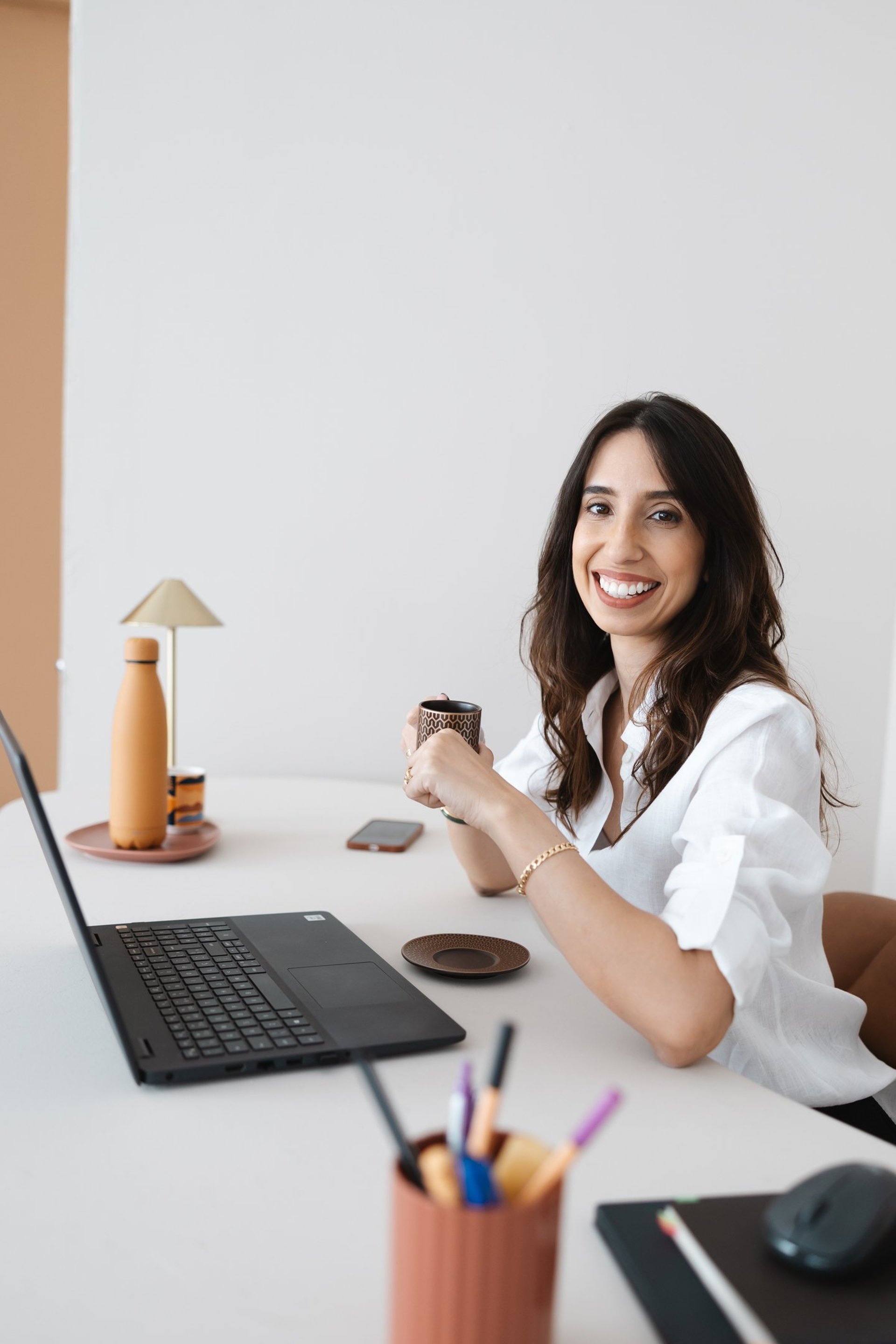 a close up of a black and brown abstract painting