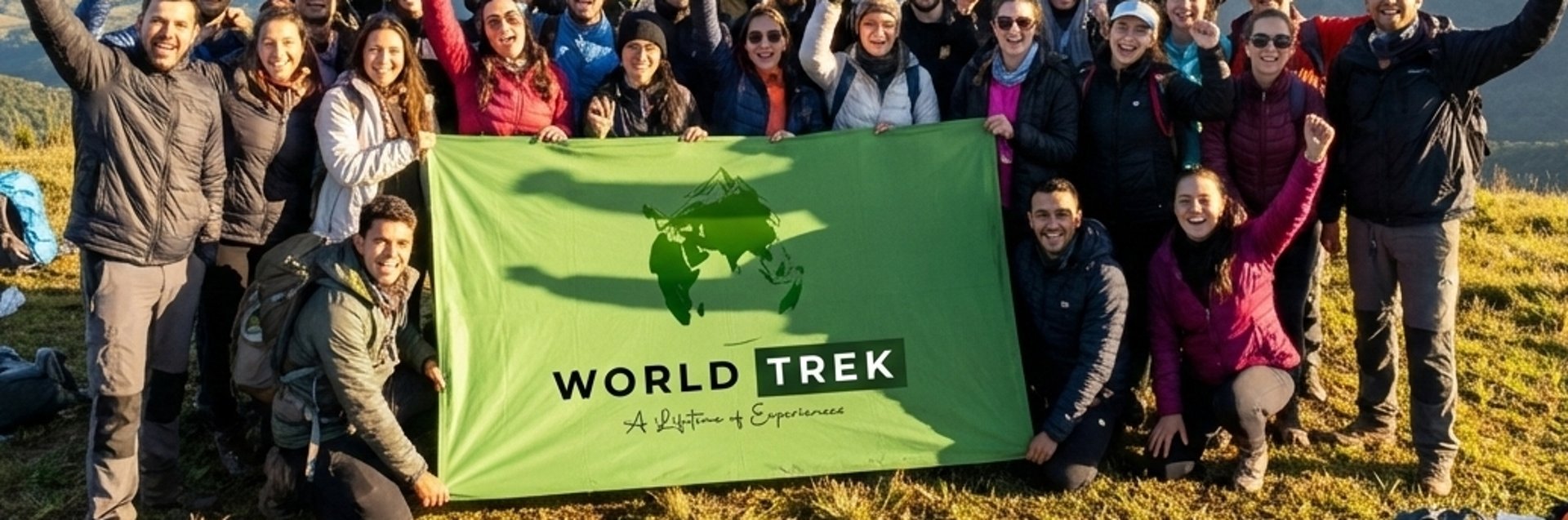 woman in white tank top sitting on rock near lake during daytime