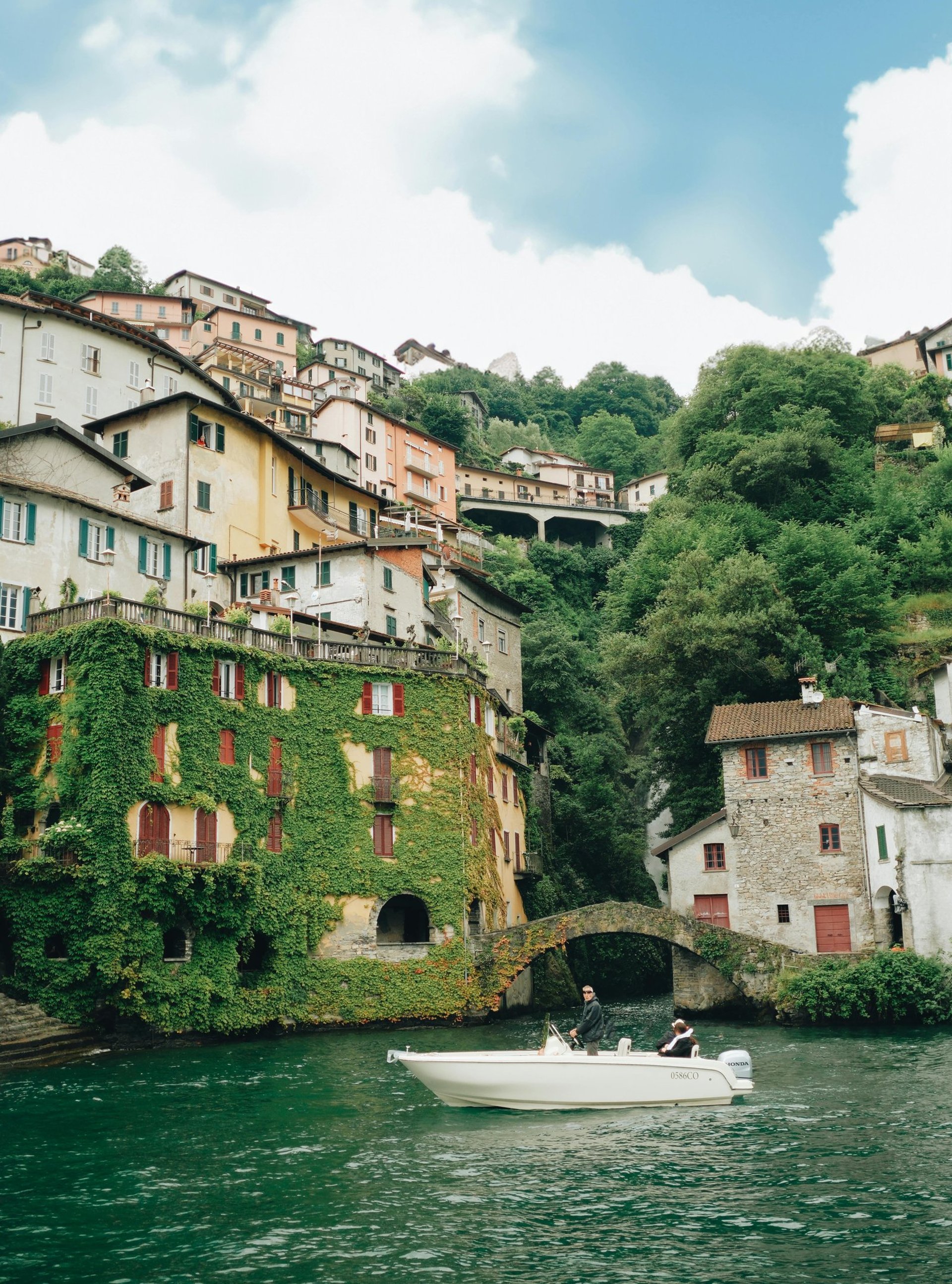 an abstract photo of a curved building with a blue sky in the background