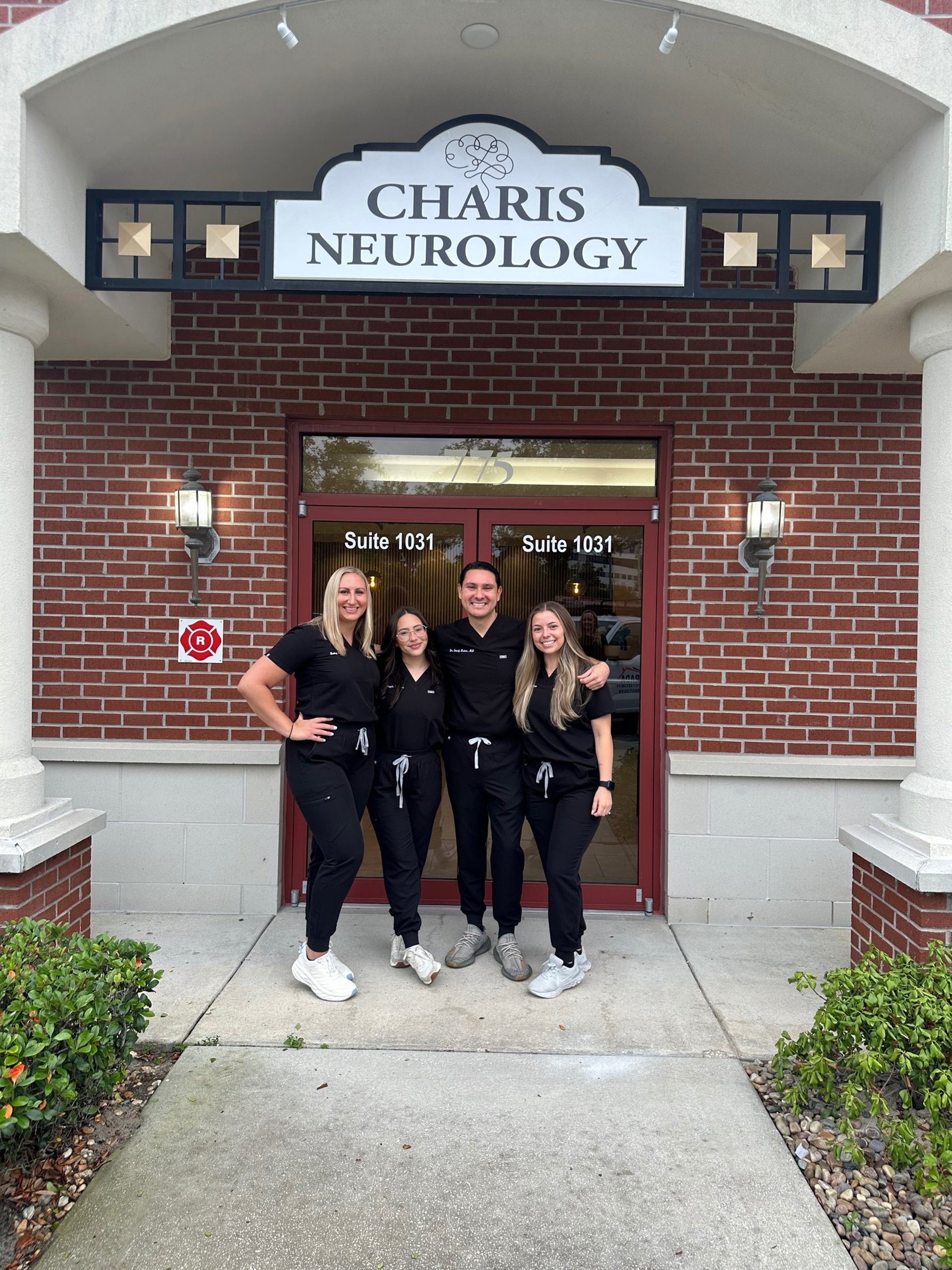 Charis Neurology Team in front of the Medical Clinic