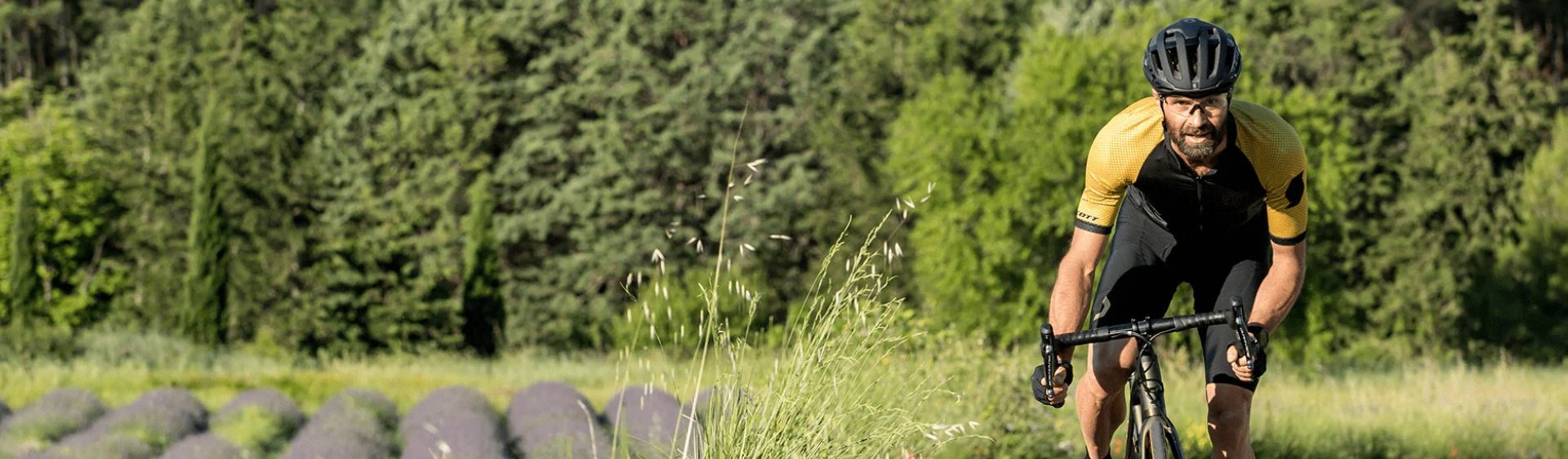 woman wearing yellow long-sleeved dress under white clouds and blue sky during daytime