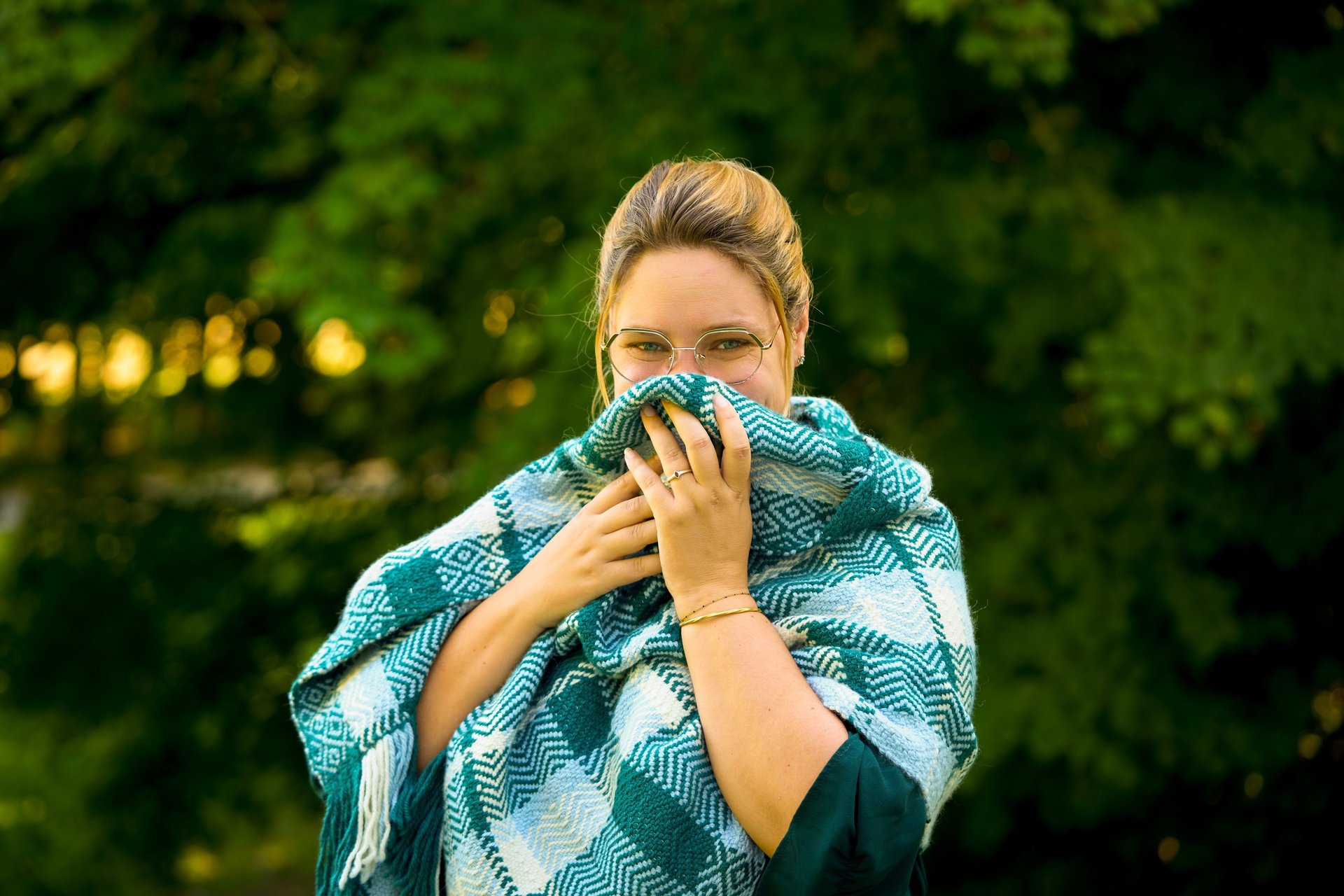 an abstract photo of a curved building with a blue sky in the background