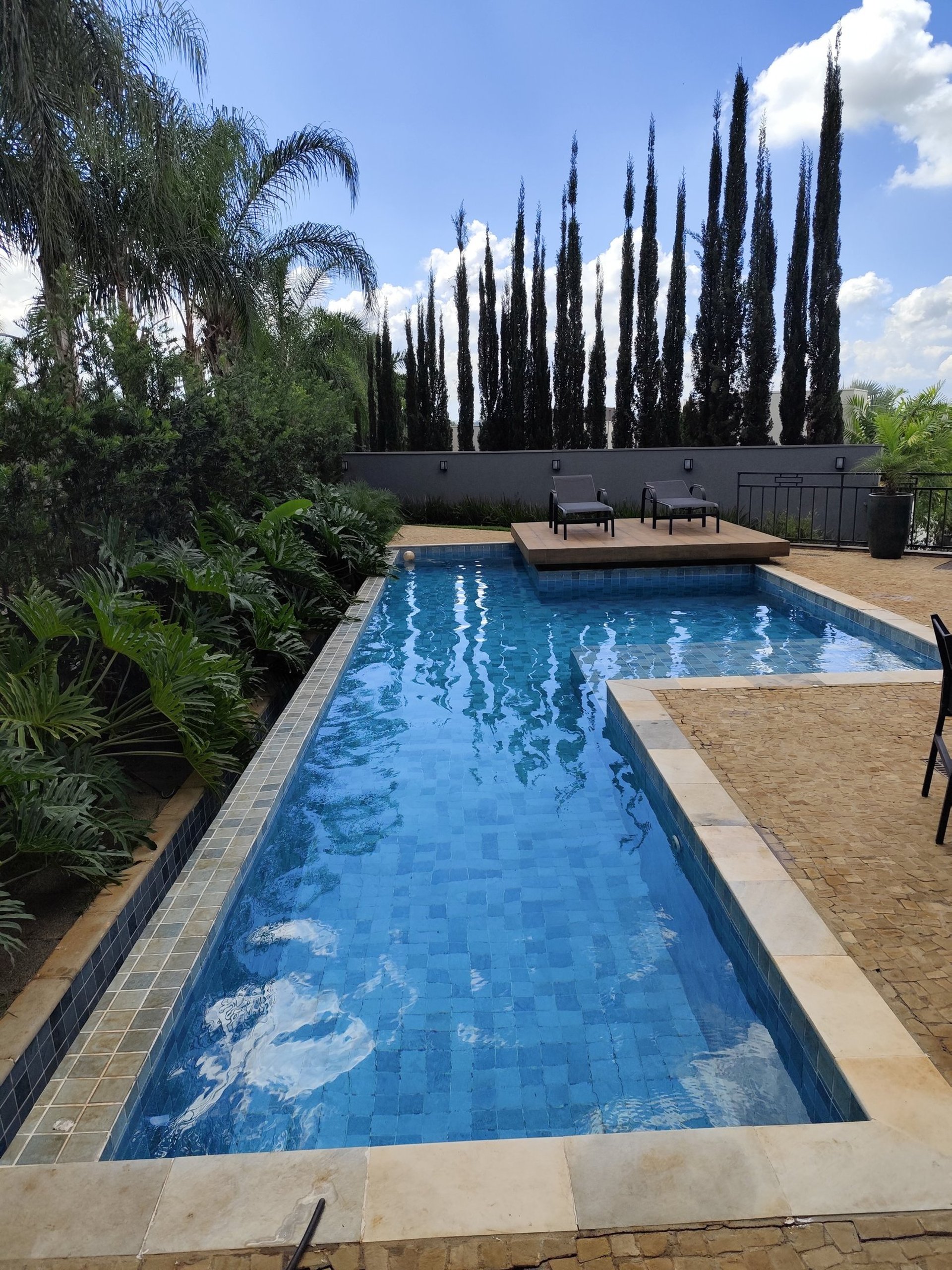 swimming pool during daytime in aerial view photography