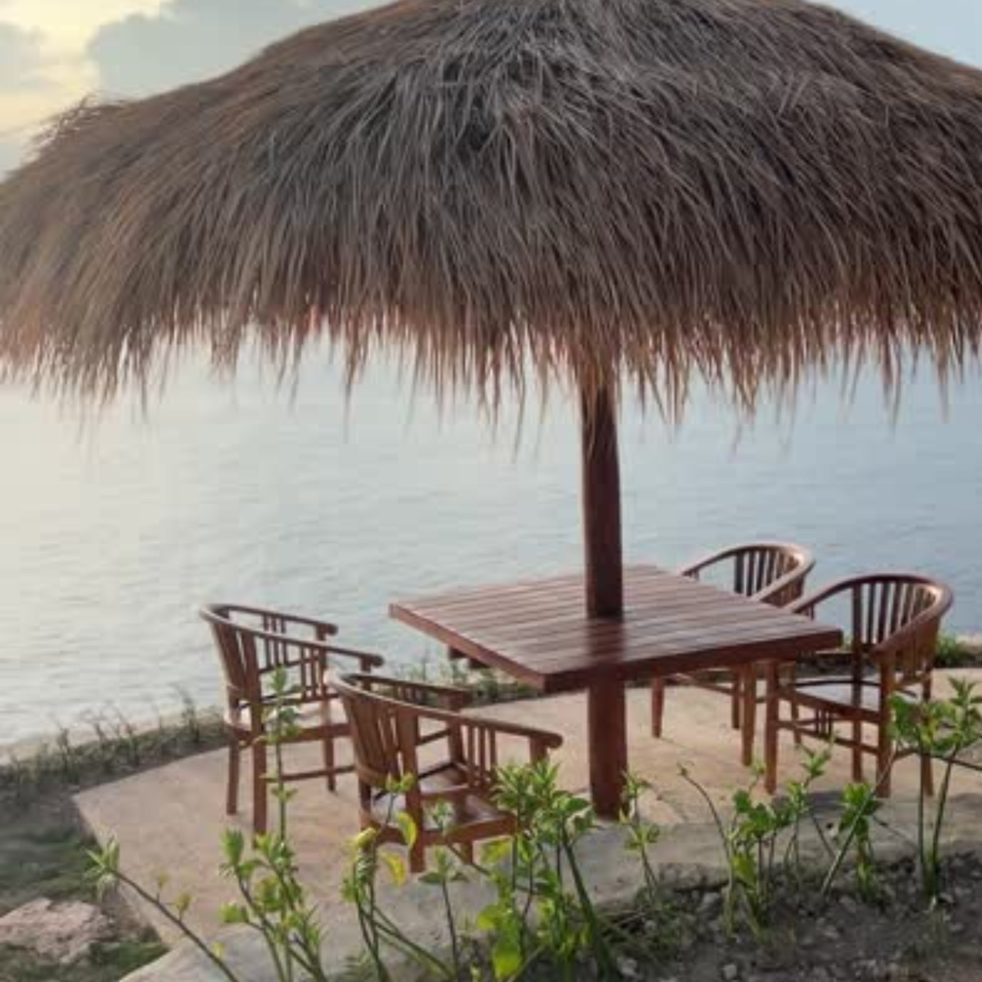 an abstract photo of a curved building with a blue sky in the background