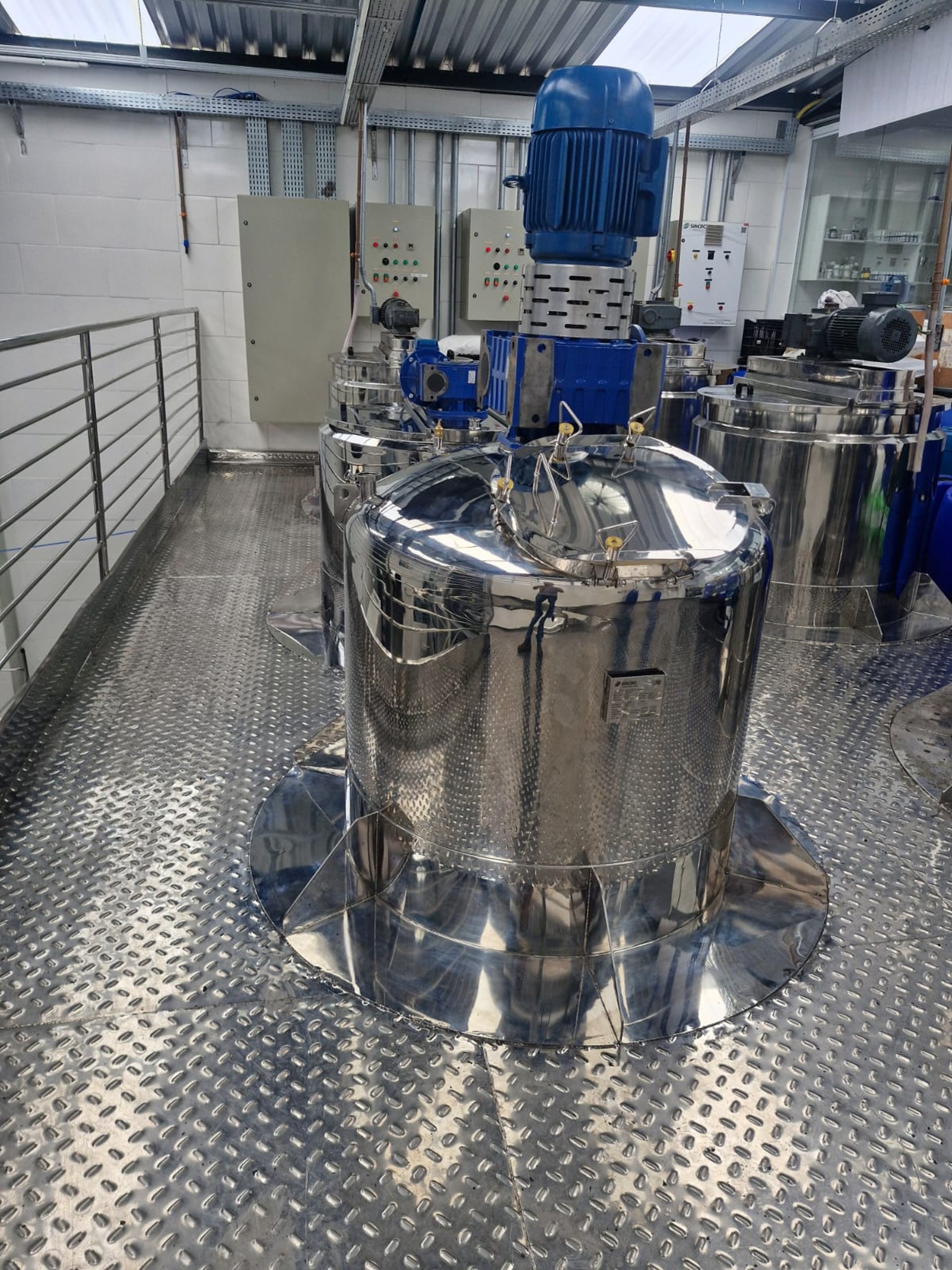 black and brown leather padded tub sofa