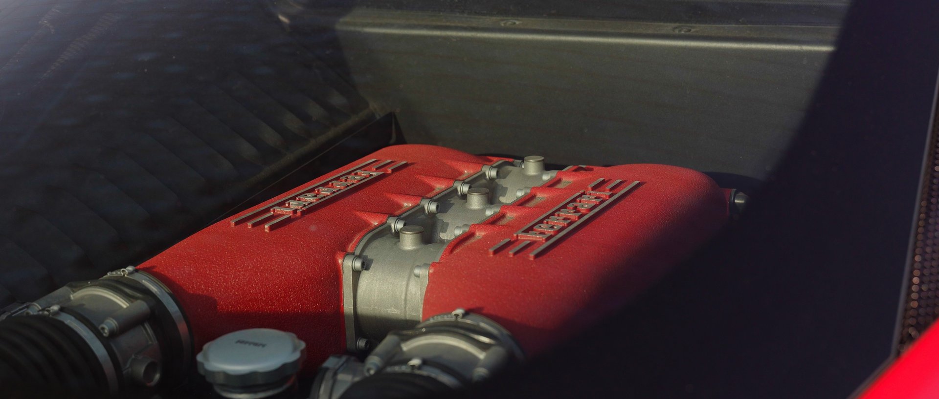 red volkswagen beetle parked on gray asphalt road during daytime