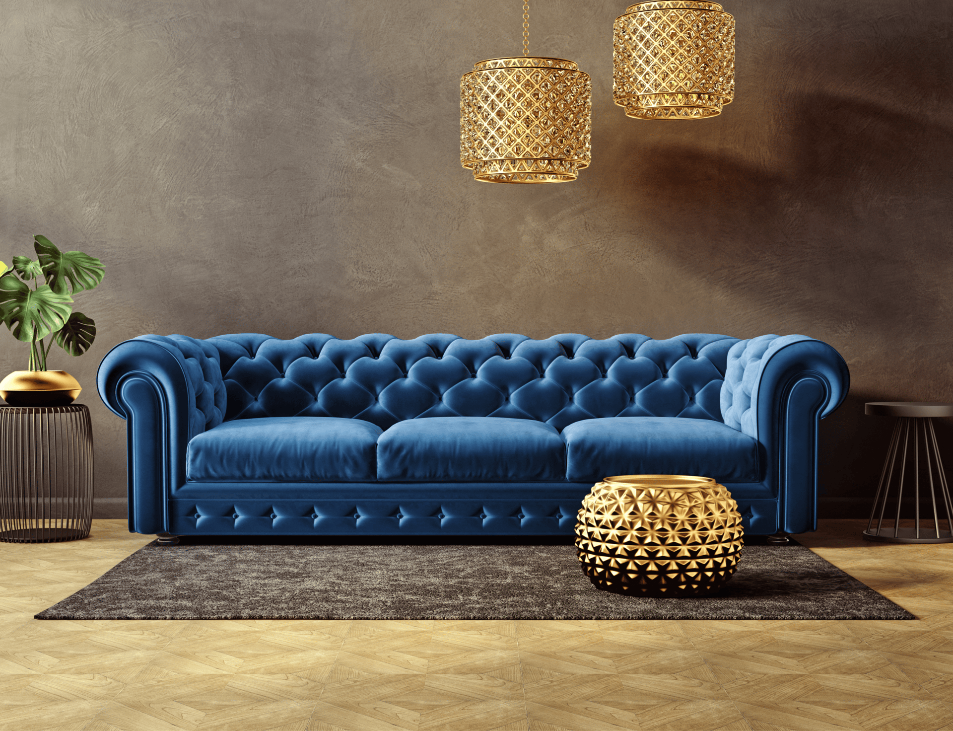 Salón elegante con sofá azul tipo chesterfield, lámparas colgantes doradas y decoración moderna, ideal para vender piso en Ma
