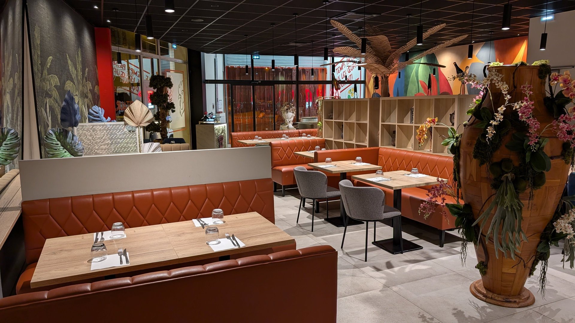 an abstract photo of a curved building with a blue sky in the background