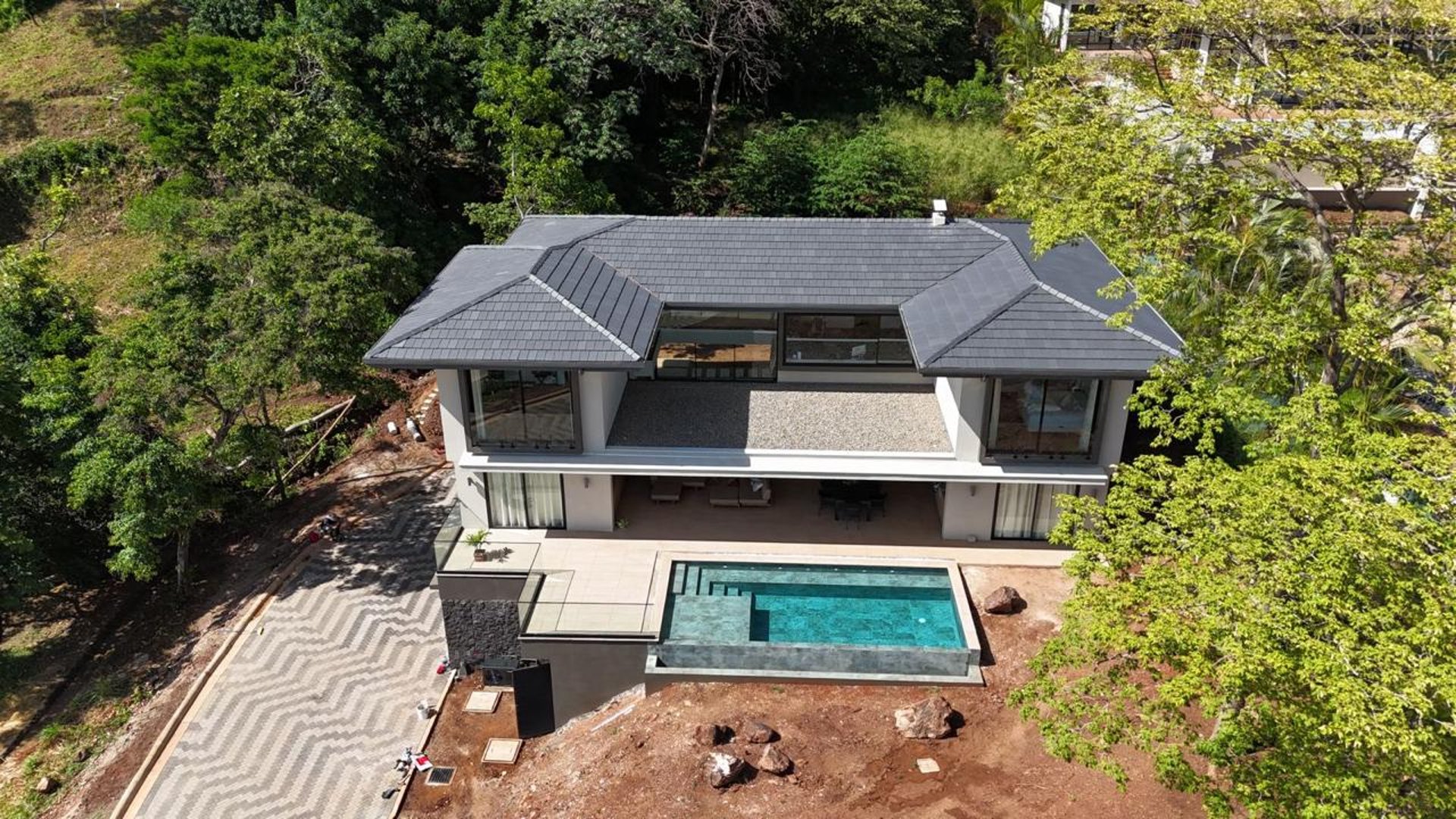 black and brown leather padded tub sofa