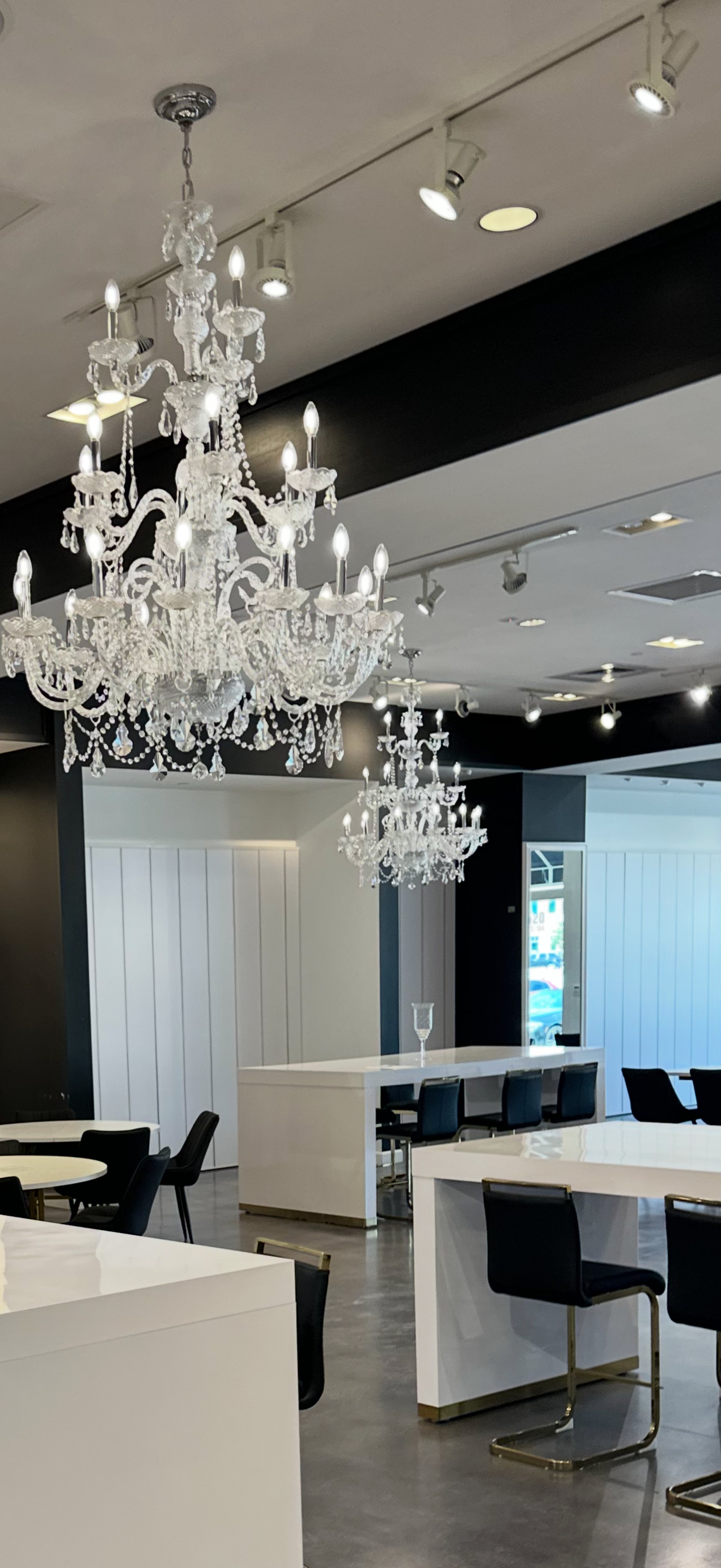 an abstract photo of a curved building with a blue sky in the background