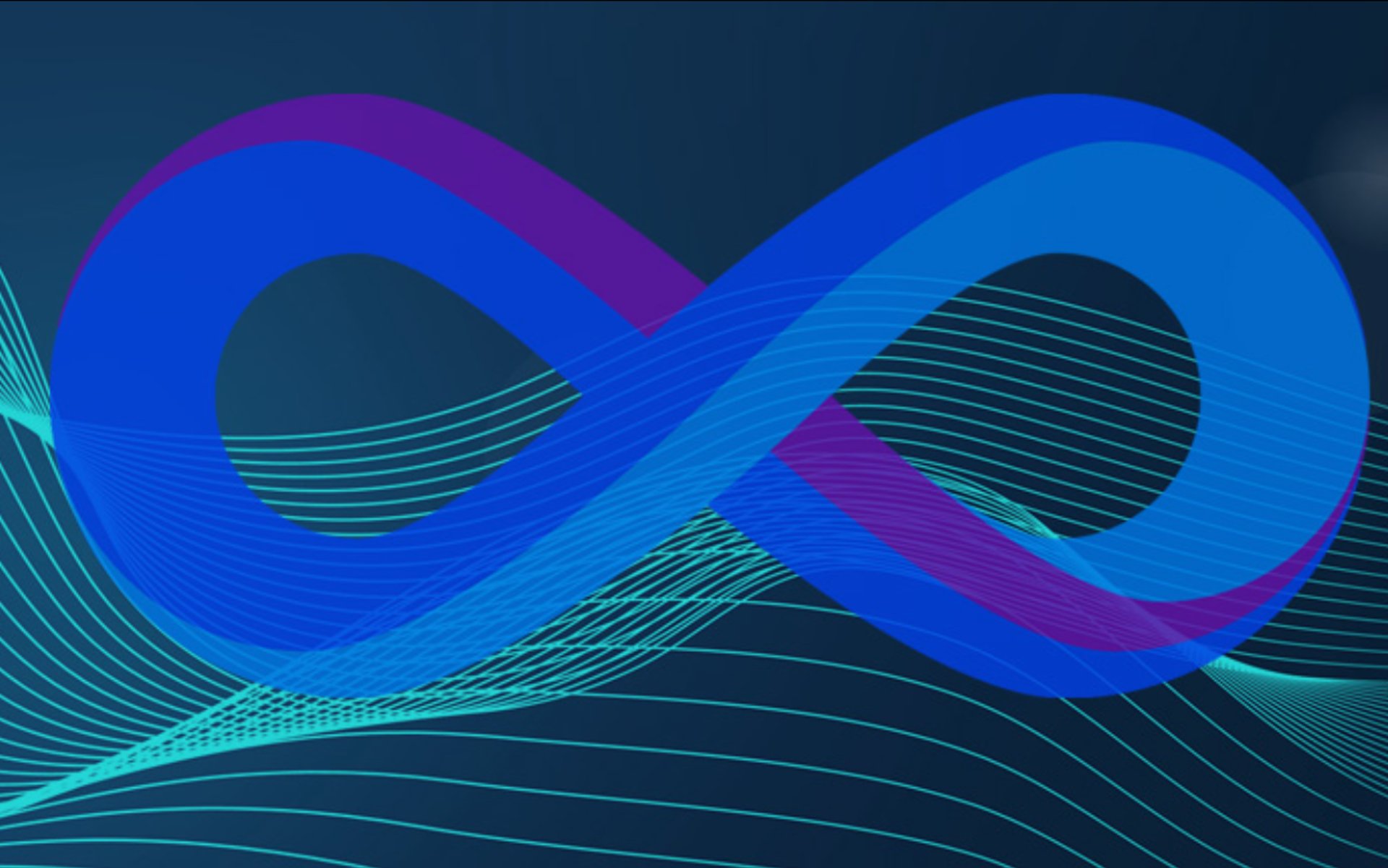 A lion peers out from tall grass.