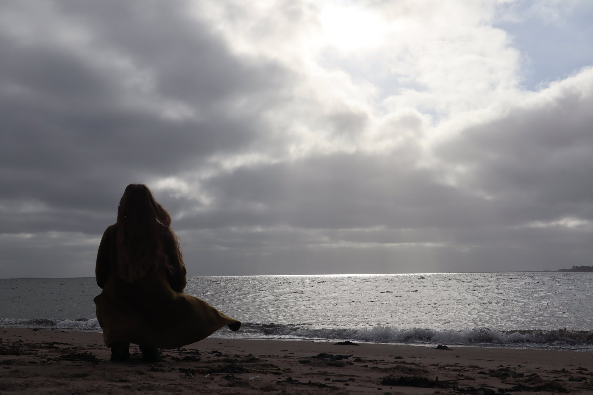 a close up of a black and brown abstract painting
