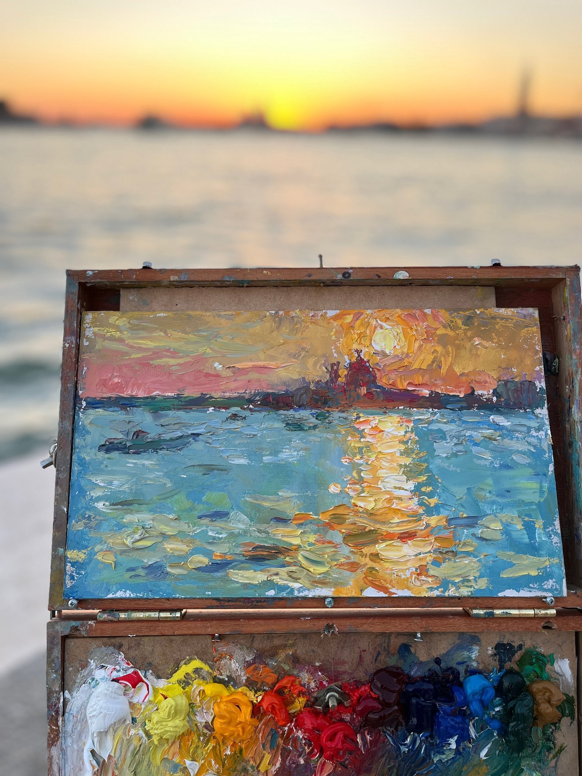 an abstract photo of a curved building with a blue sky in the background