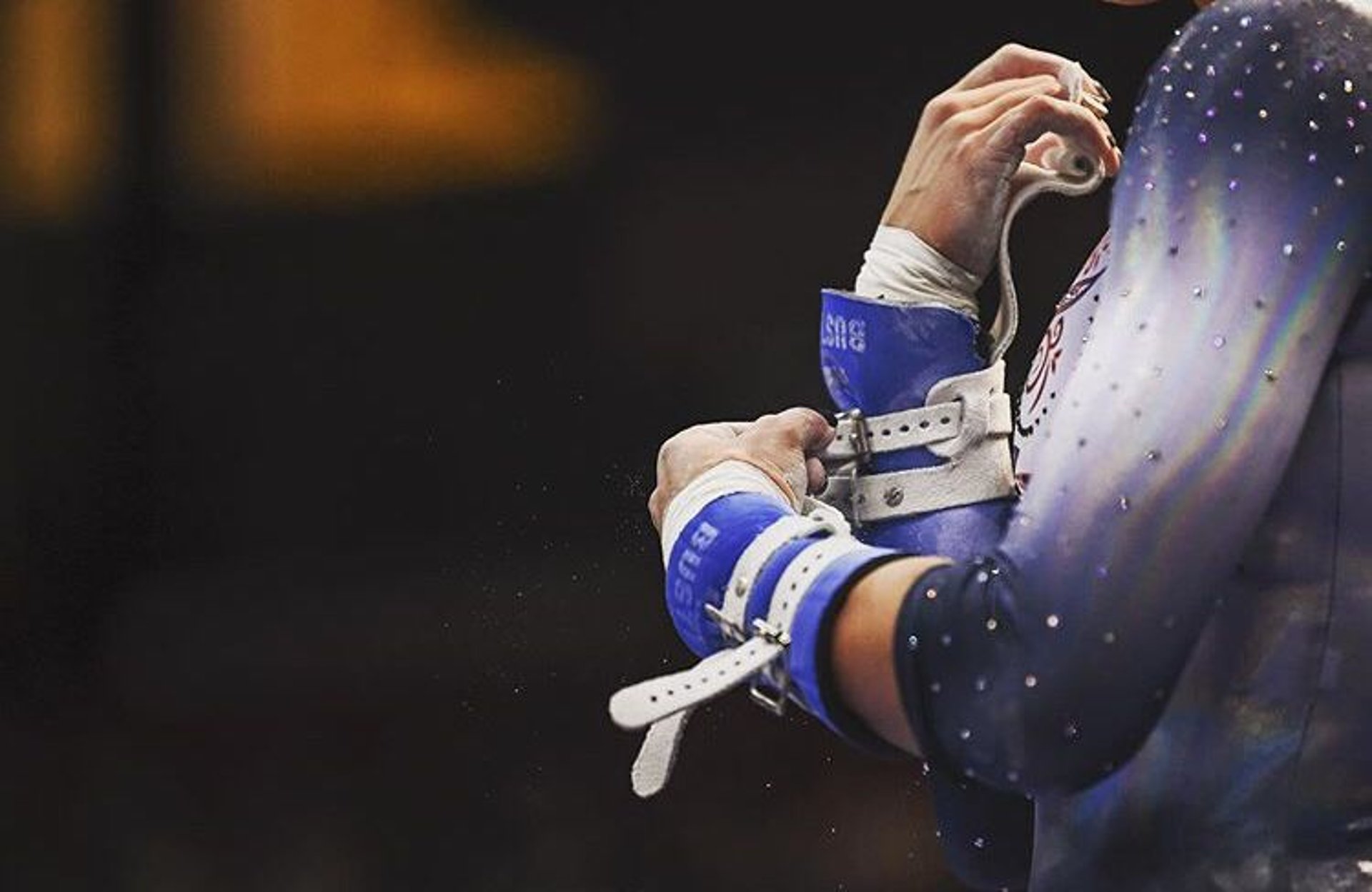 an abstract photo of a curved building with a blue sky in the background