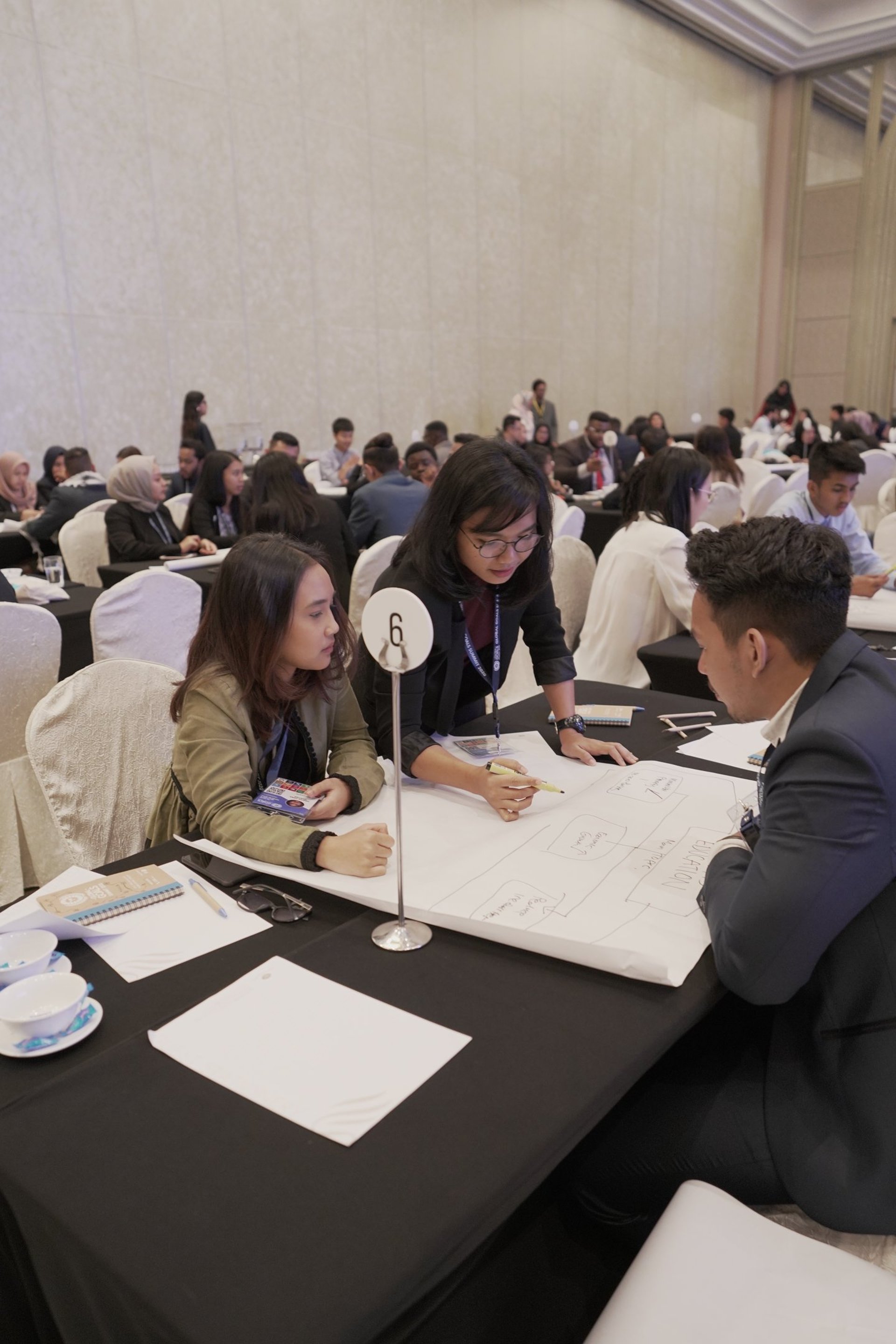 woman in blue and white shirt