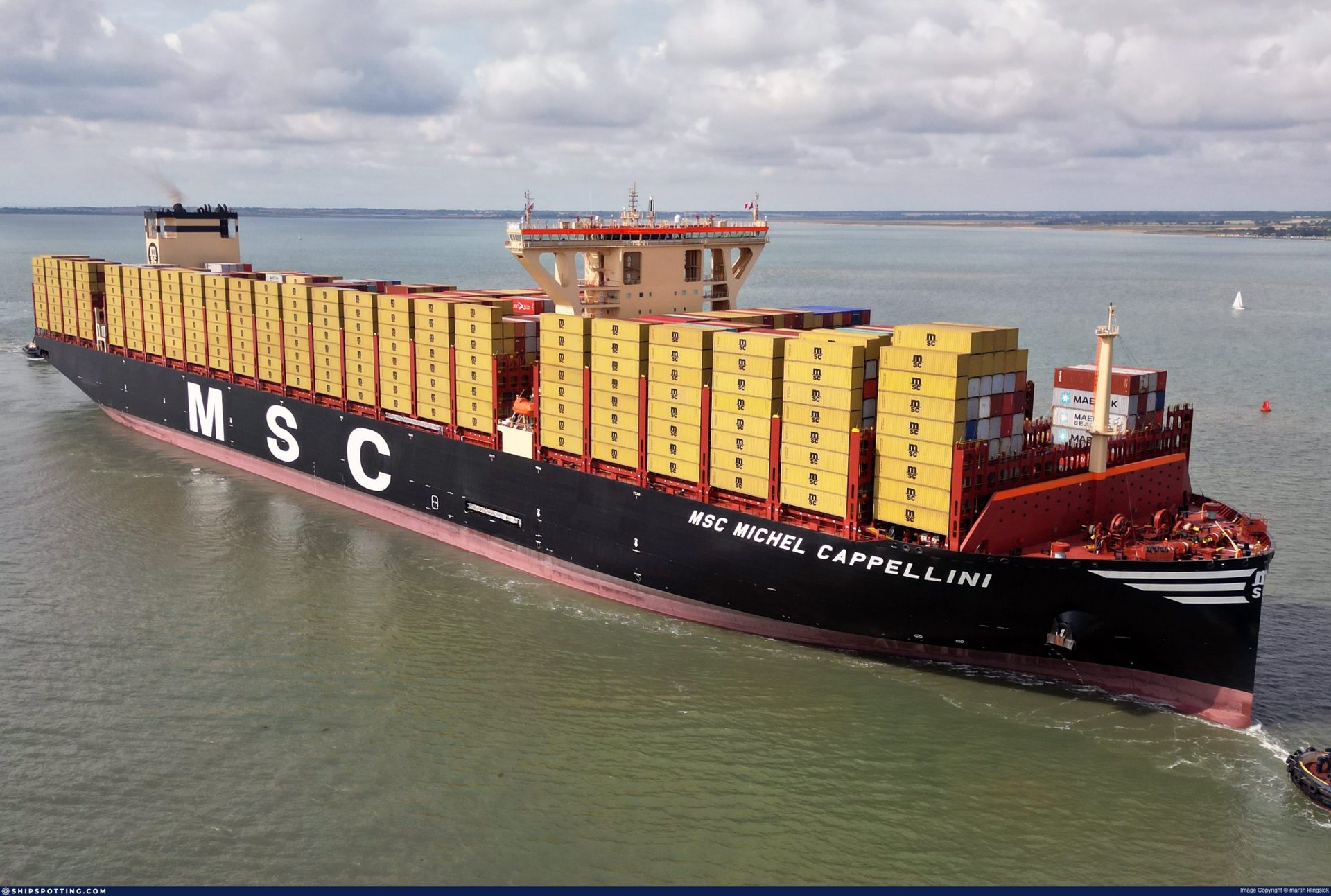 black and brown leather padded tub sofa