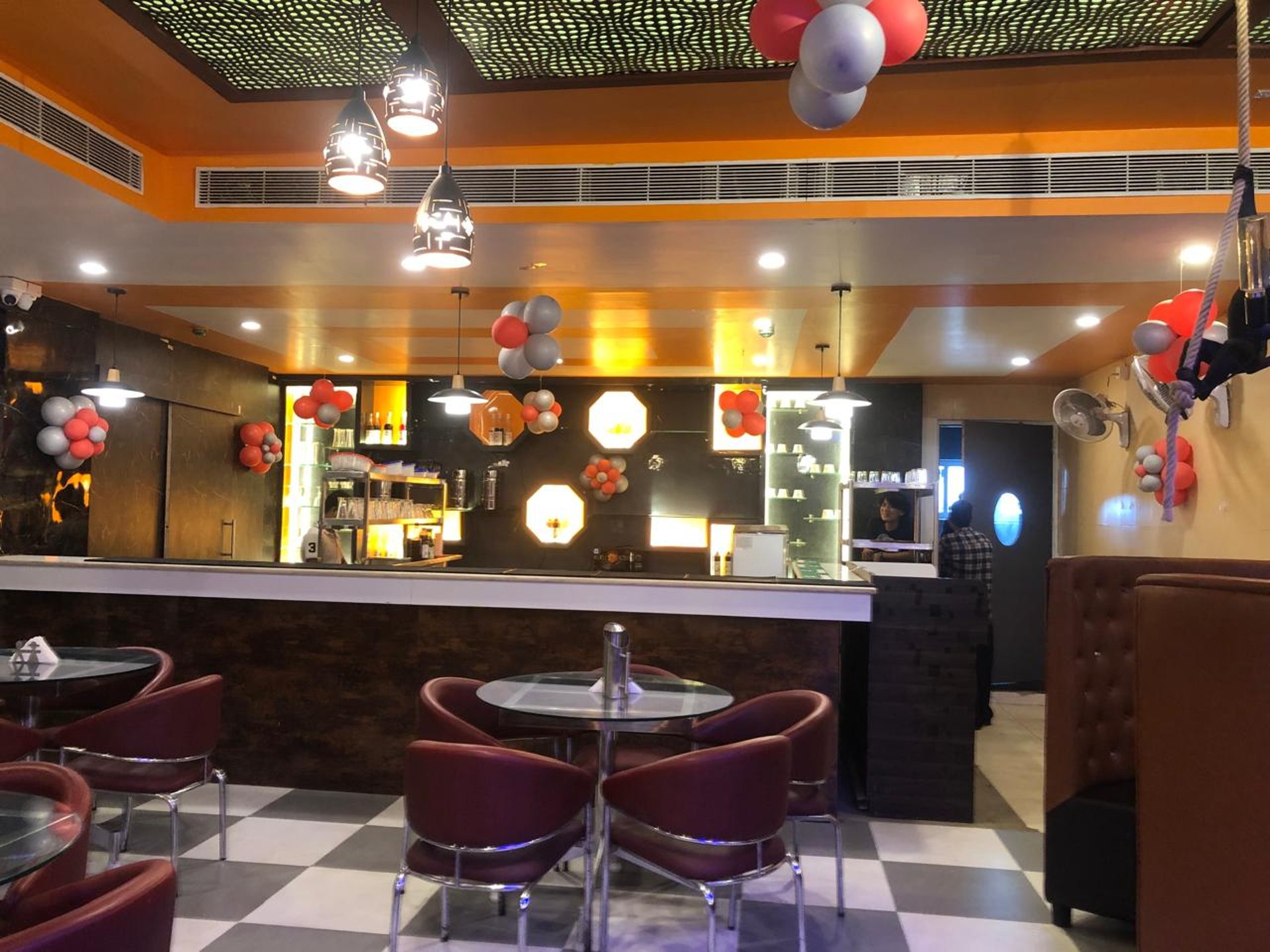 woman wearing yellow long-sleeved dress under white clouds and blue sky during daytime