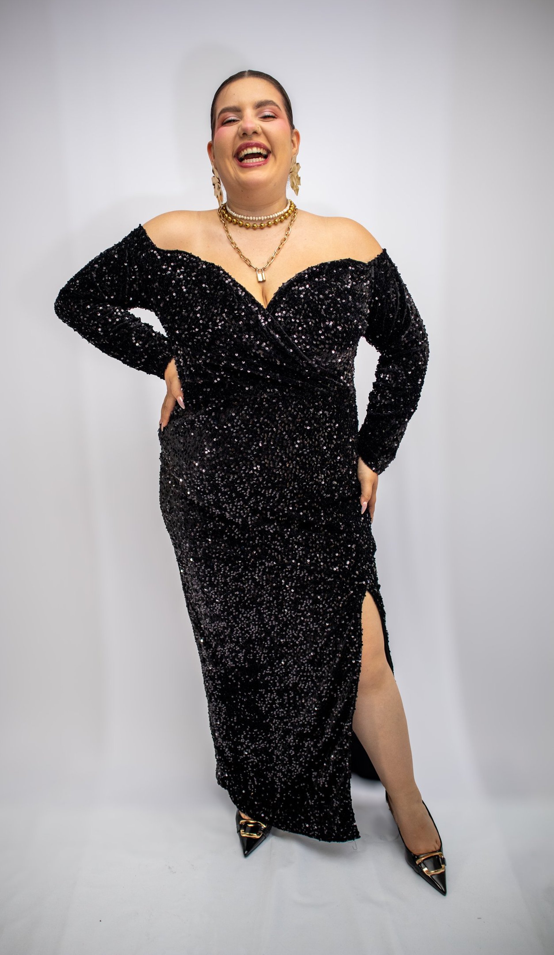 woman wearing yellow long-sleeved dress under white clouds and blue sky during daytime