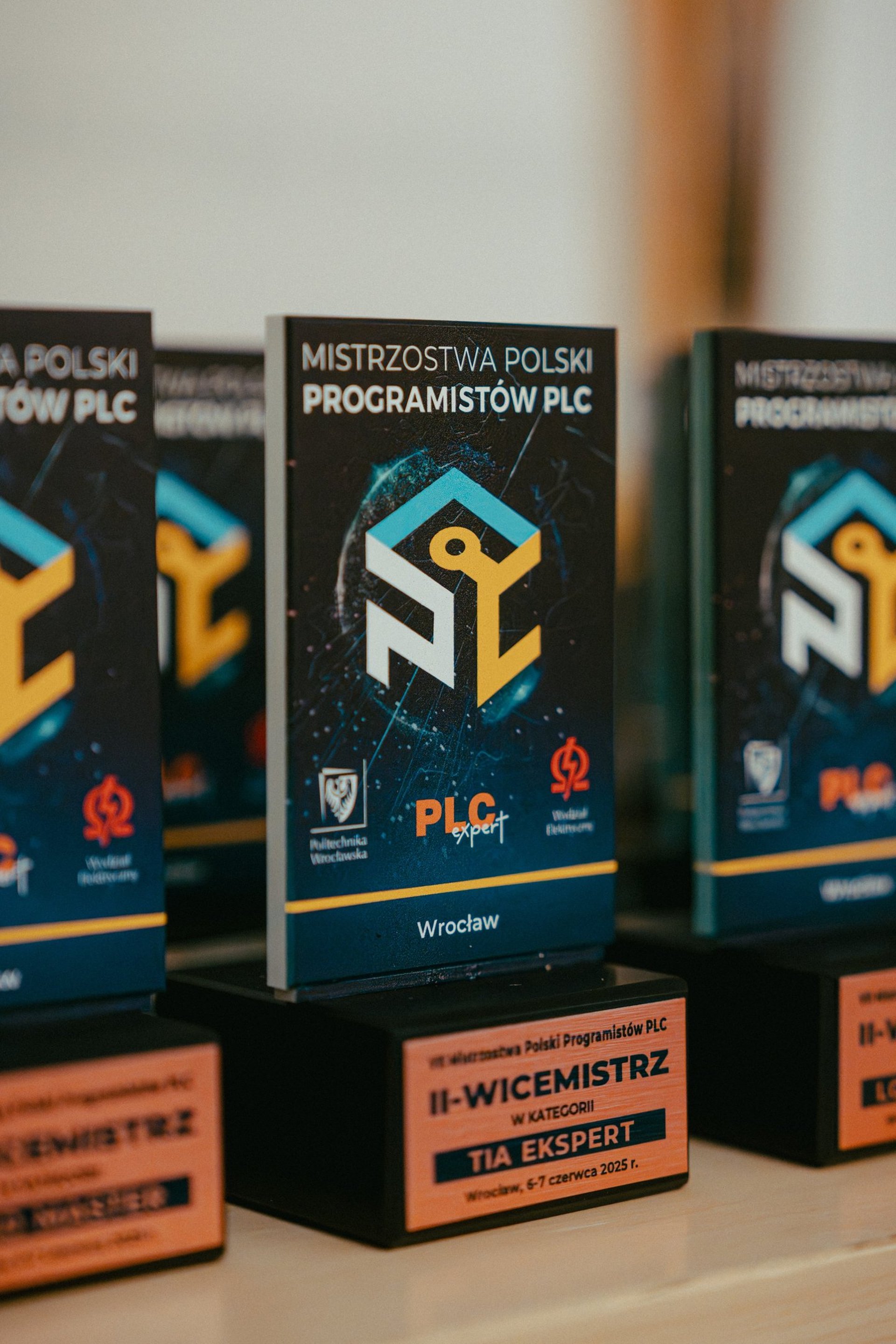 an abstract photo of a curved building with a blue sky in the background