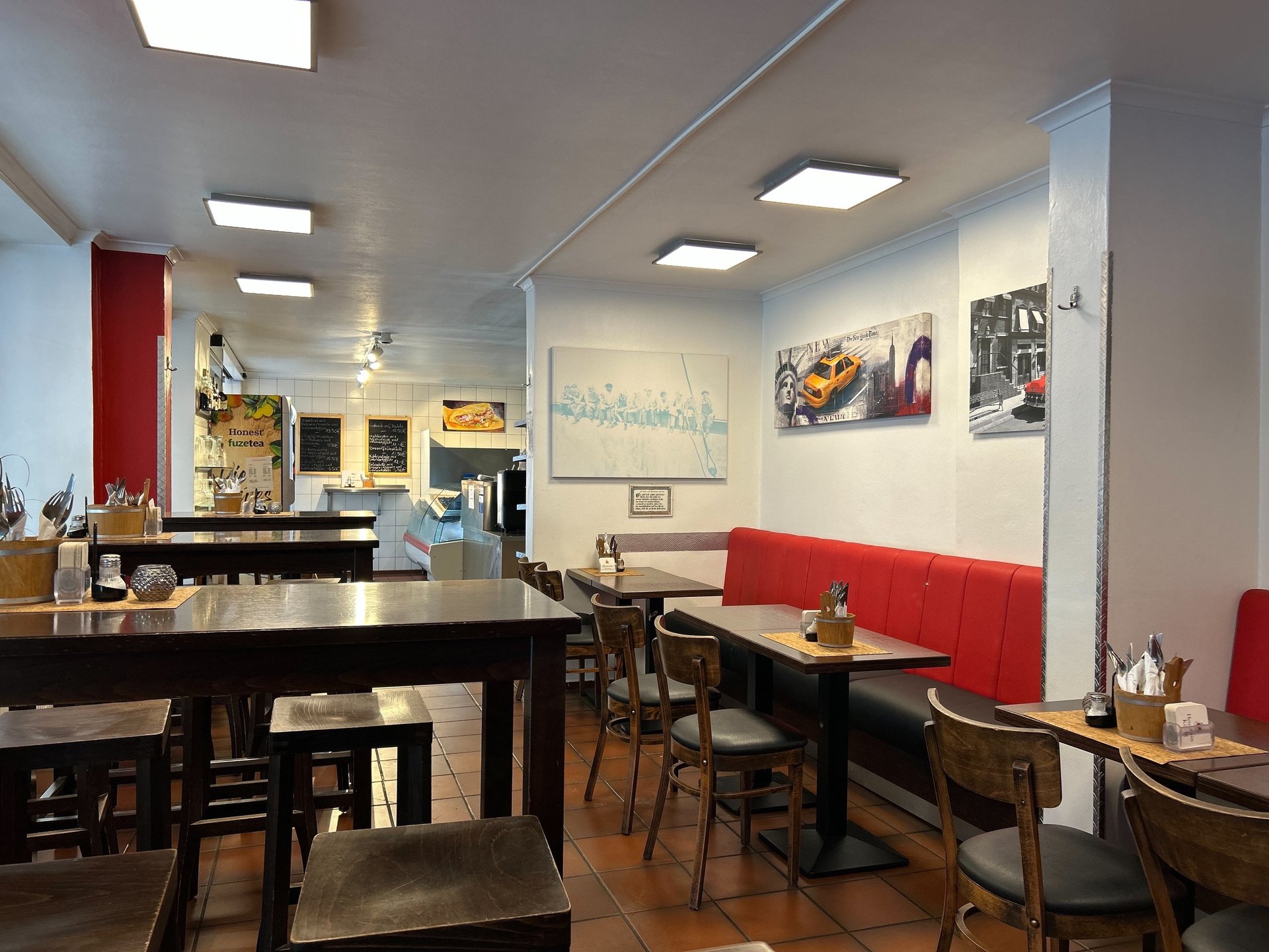 black and brown leather padded tub sofa