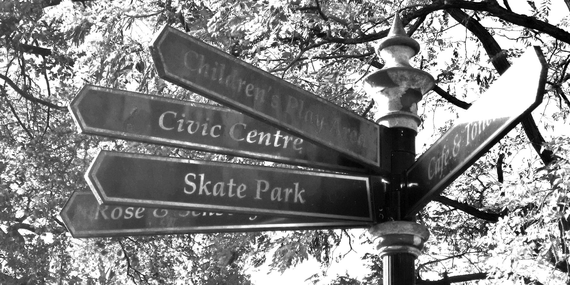 black and brown leather padded tub sofa
