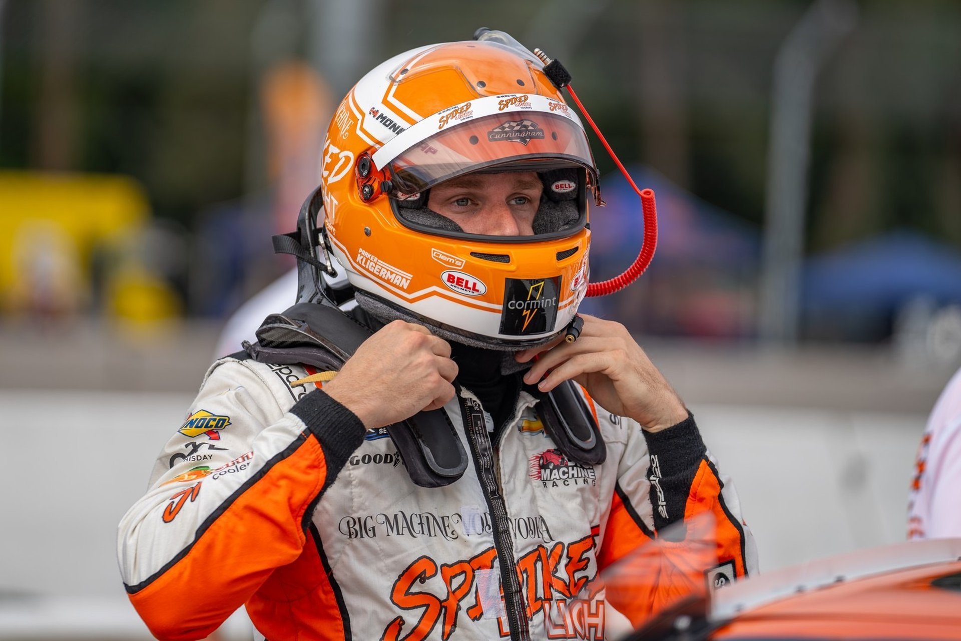 an abstract photo of a curved building with a blue sky in the background