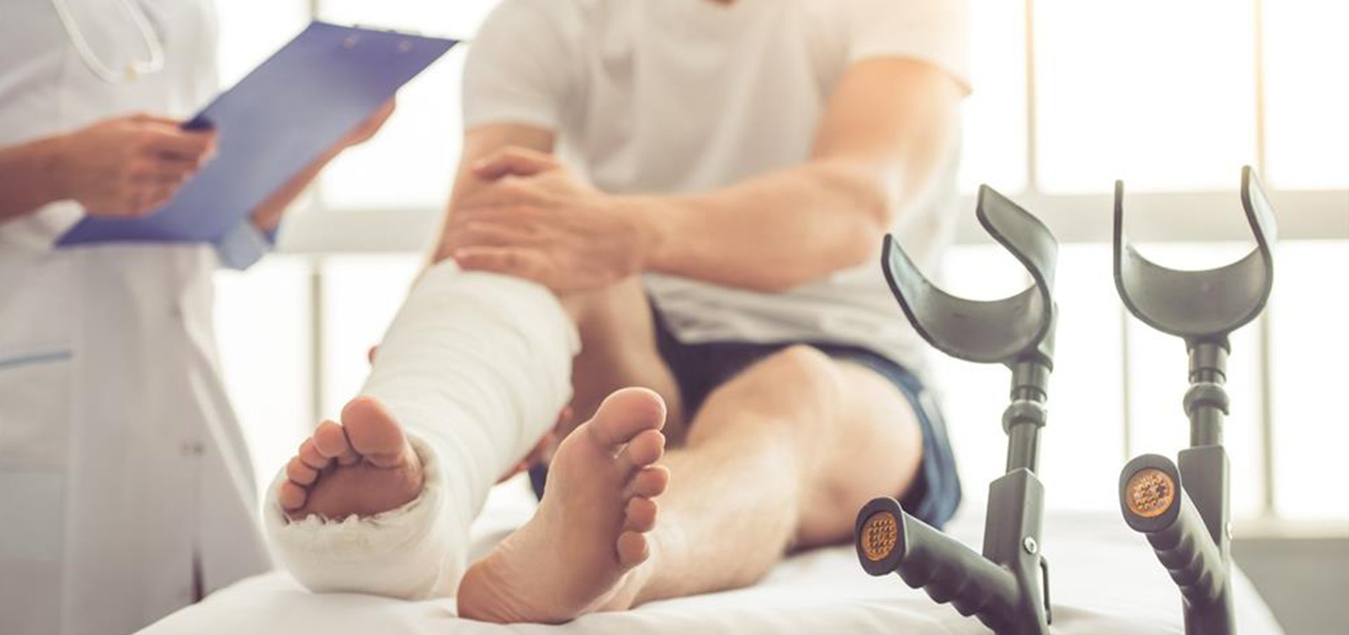 A pregnant woman standing in her crib