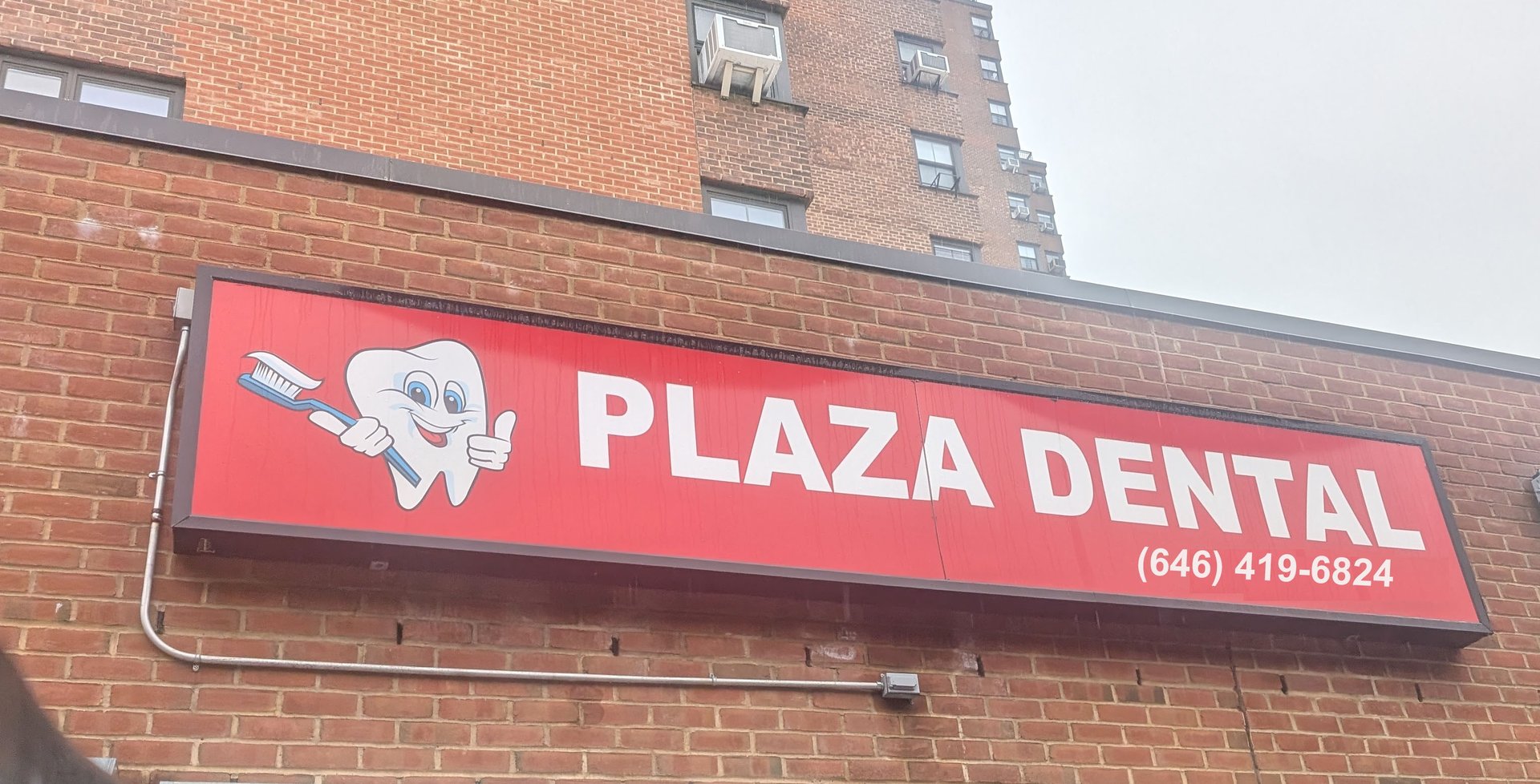 black and brown leather padded tub sofa