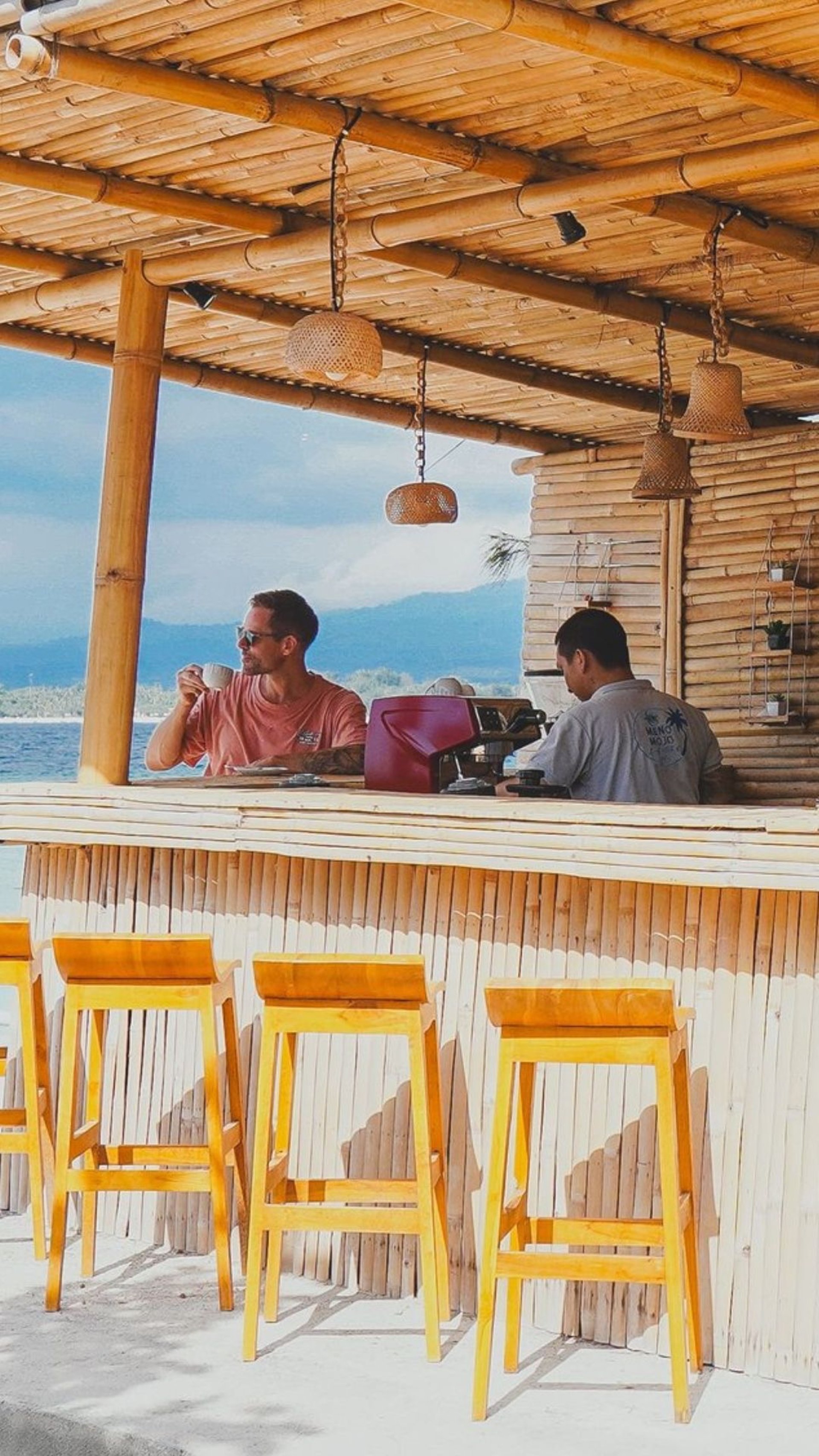 A guest drinking a delicious cappuccino at the bar at Meno Mojo Beach Resort