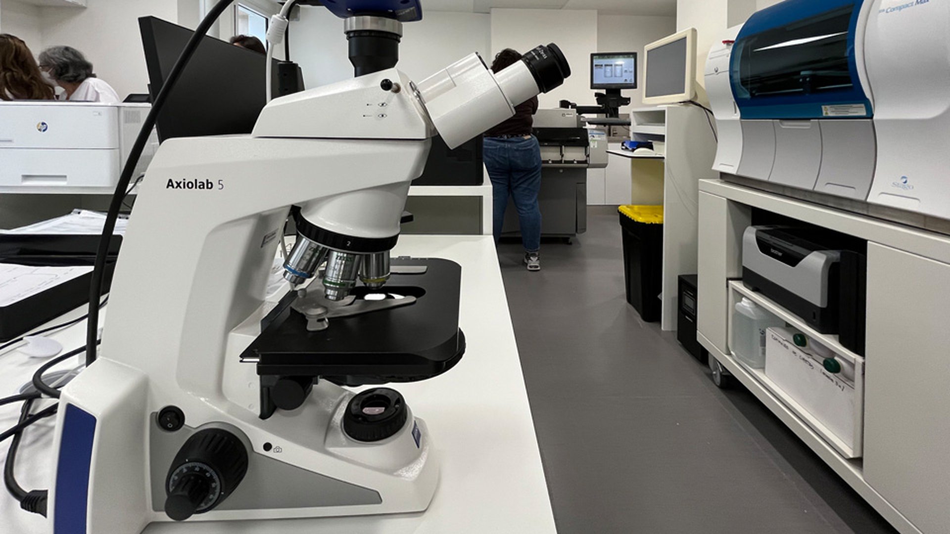 black and brown leather padded tub sofa