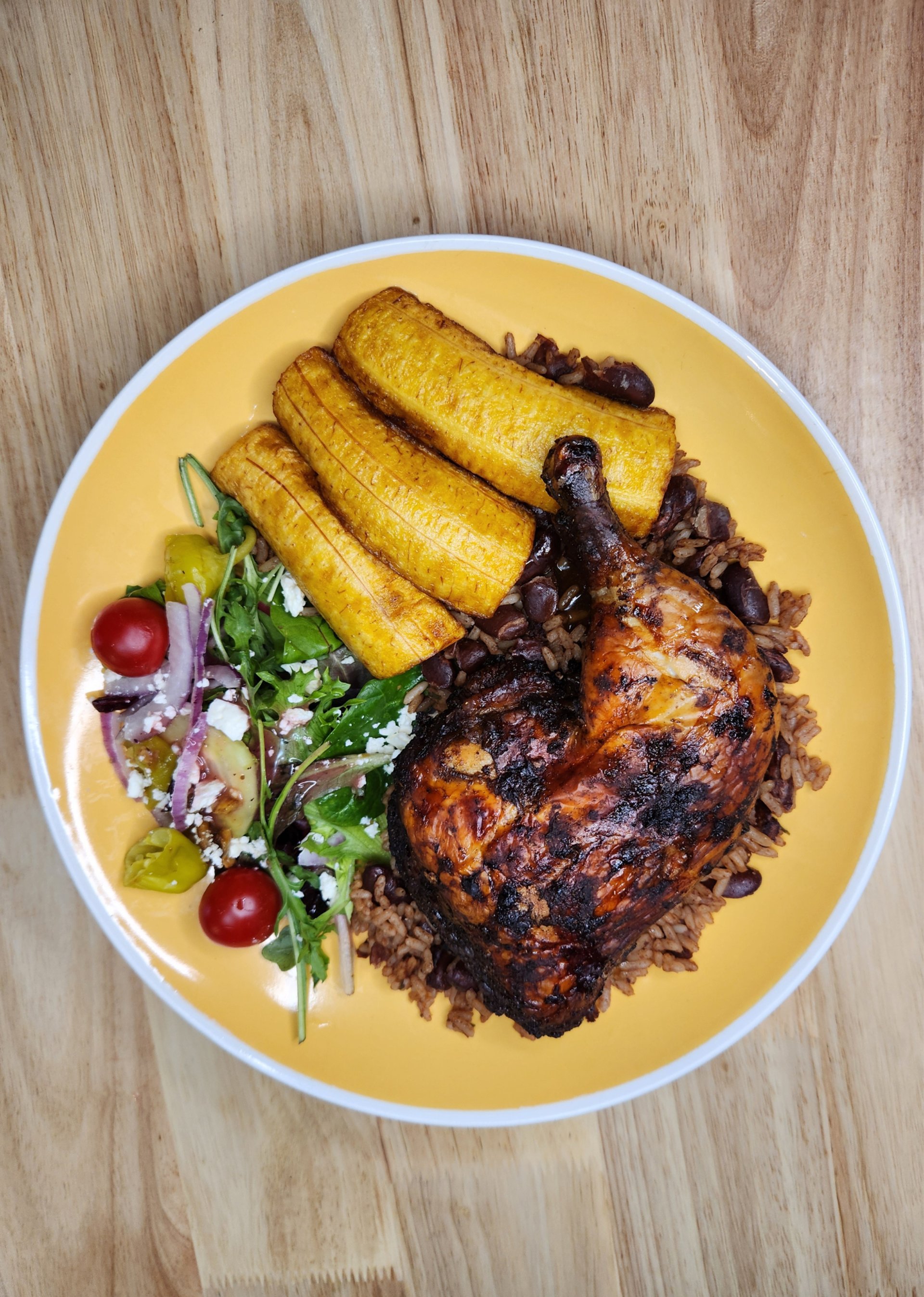 cooked meat with sliced fruits