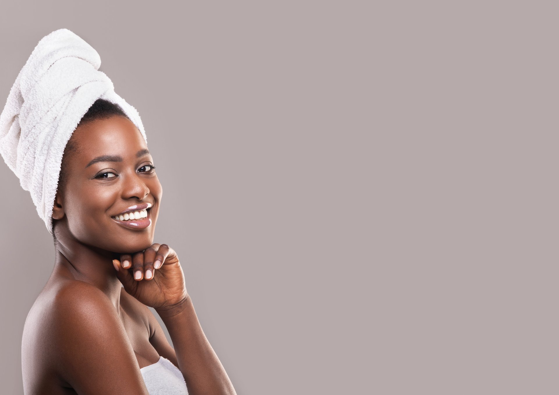 a person holding another person's hand in a hospital bed