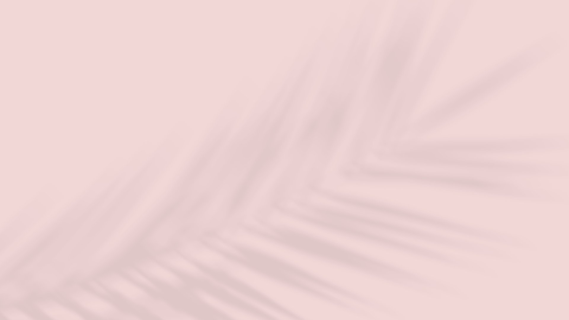 a close up of a pink and white background