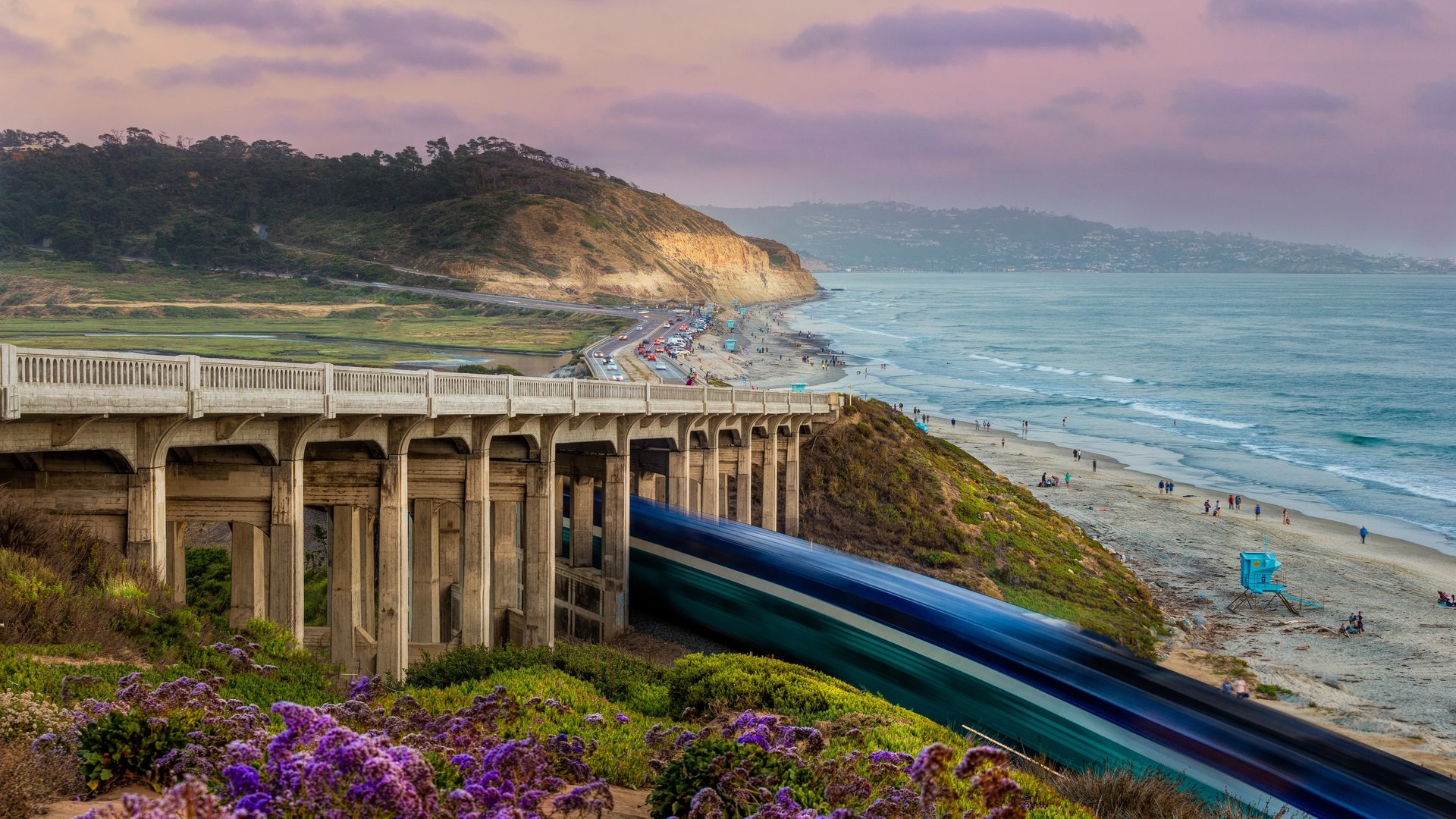PCH in San Diego showing cars and train