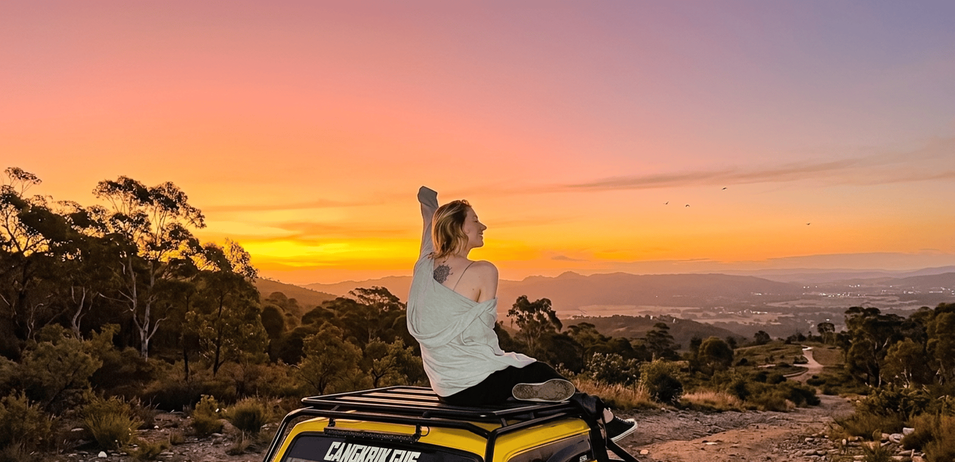 Off-road vehicle against a beautiful sunset.