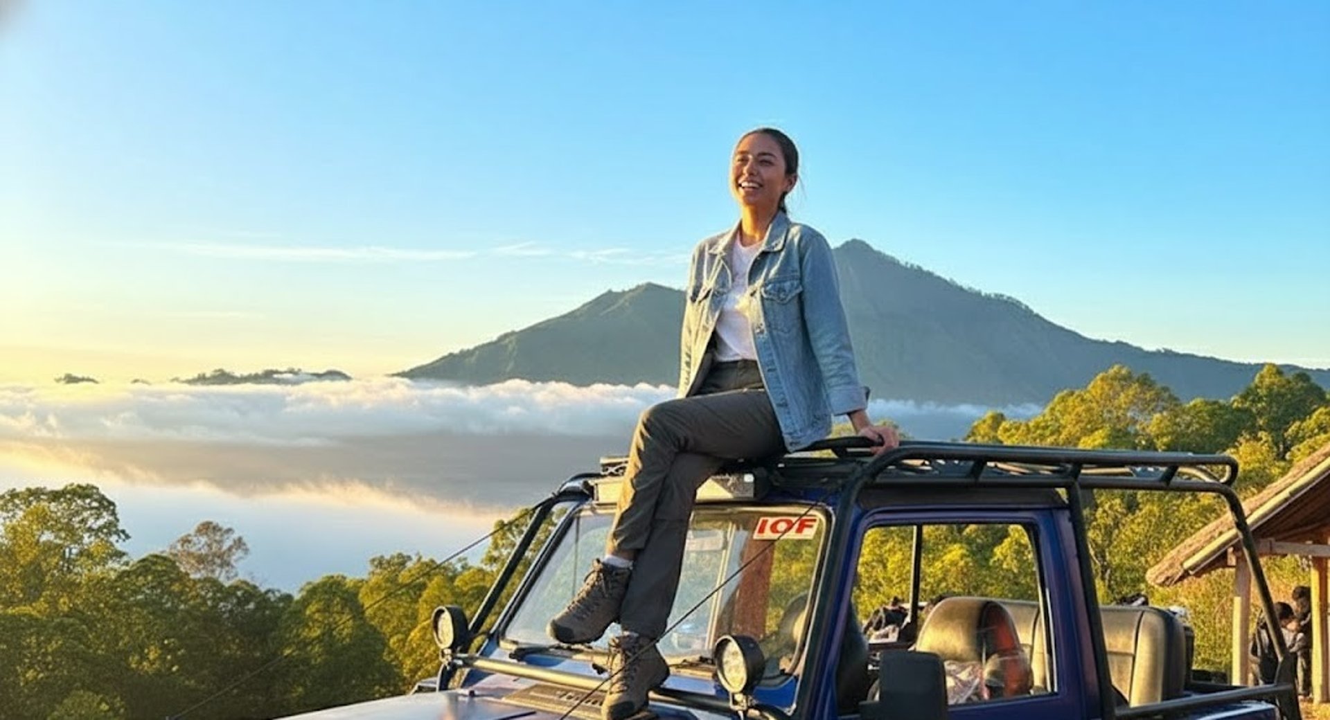 Off-road vehicle against a beautiful sunset.
