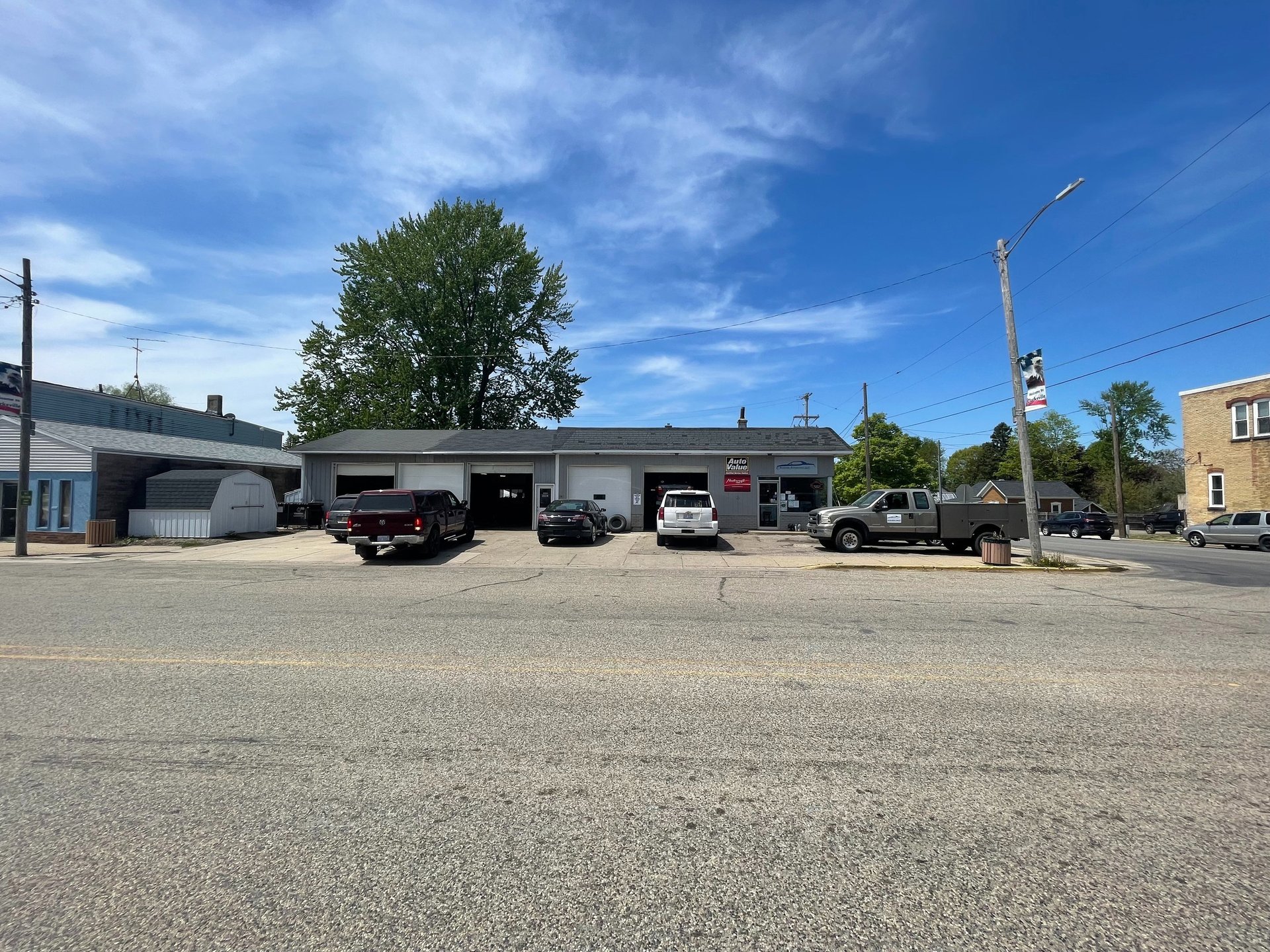 black and brown leather padded tub sofa