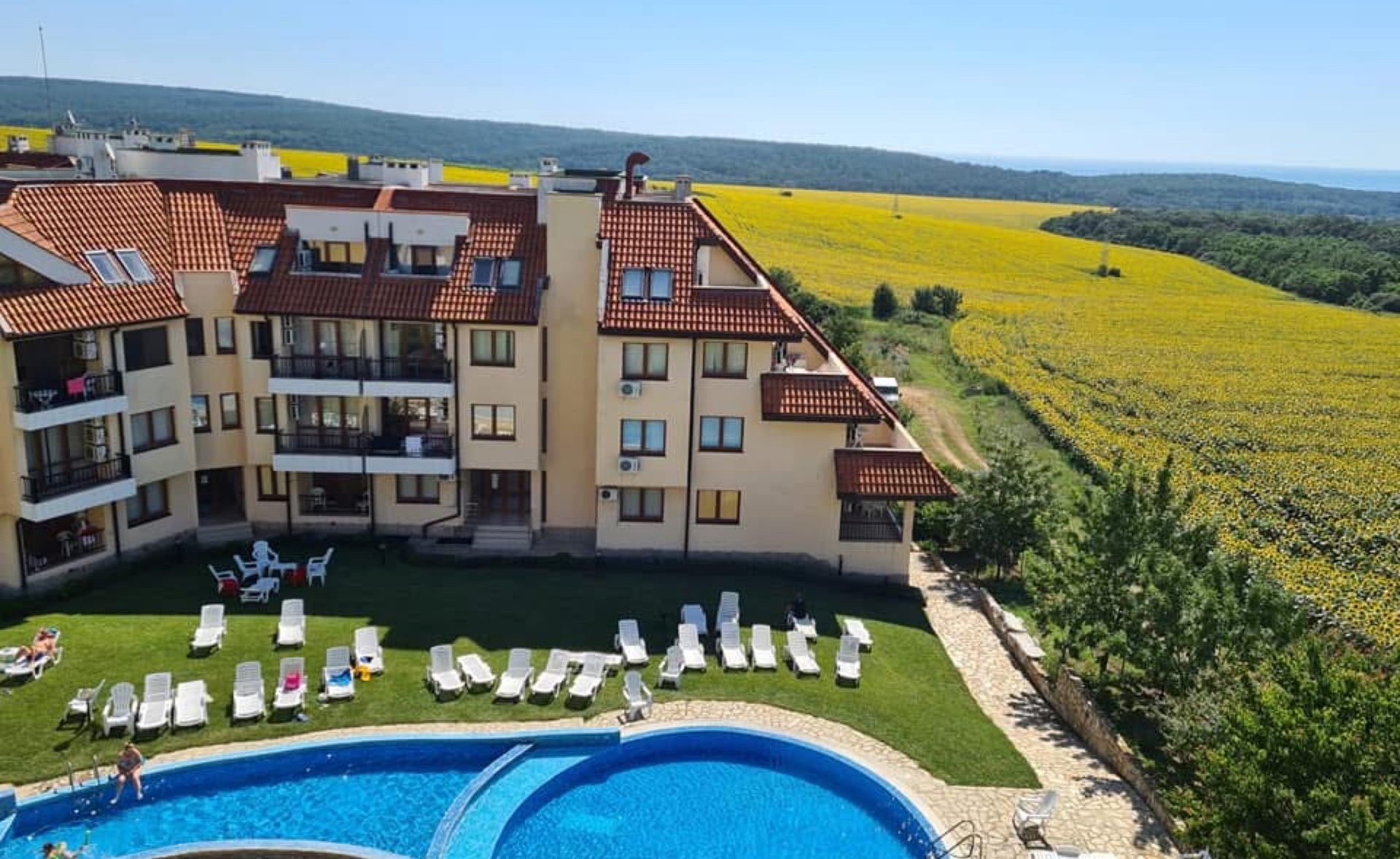 black and brown leather padded tub sofa