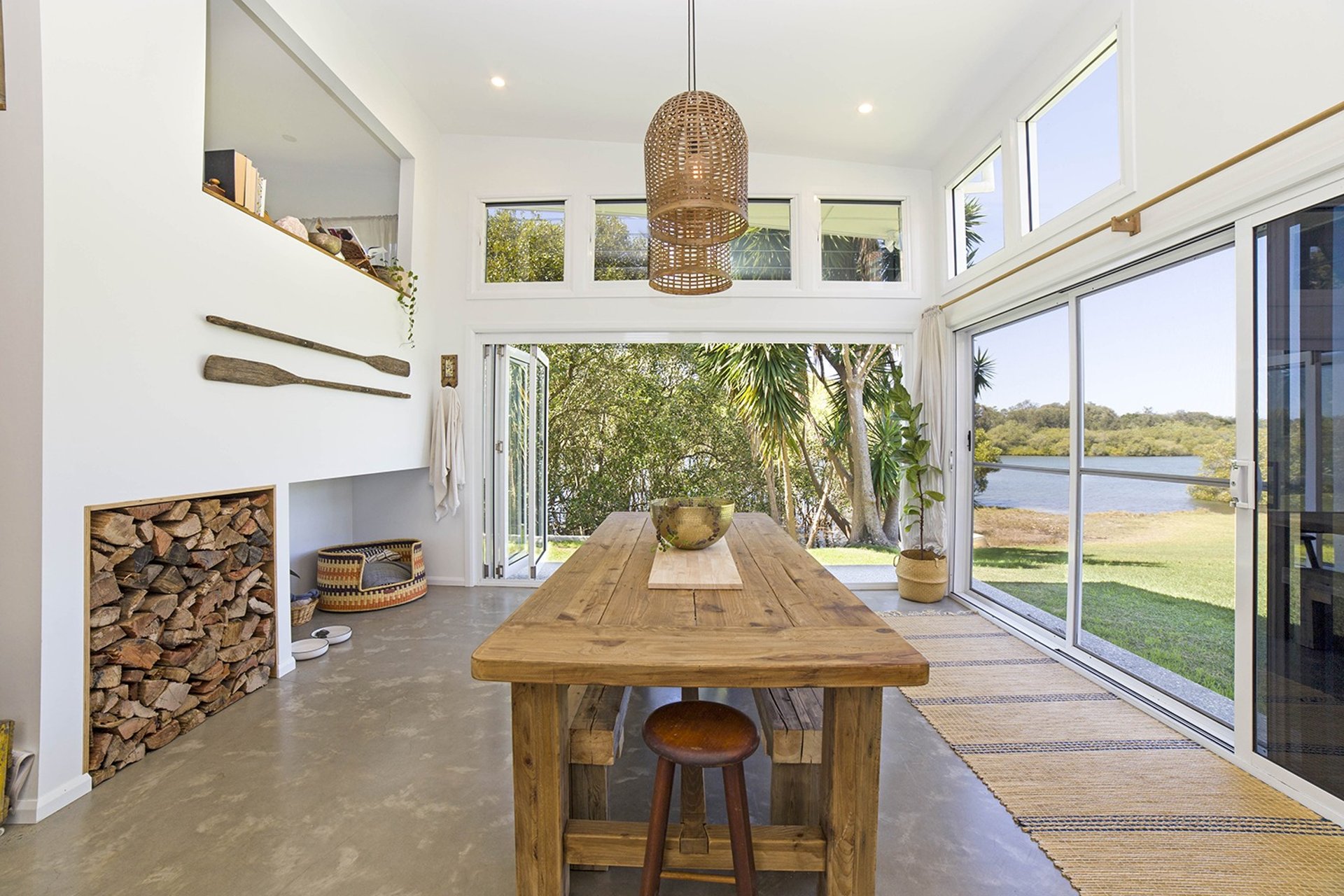 woman wearing yellow long-sleeved dress under white clouds and blue sky during daytime