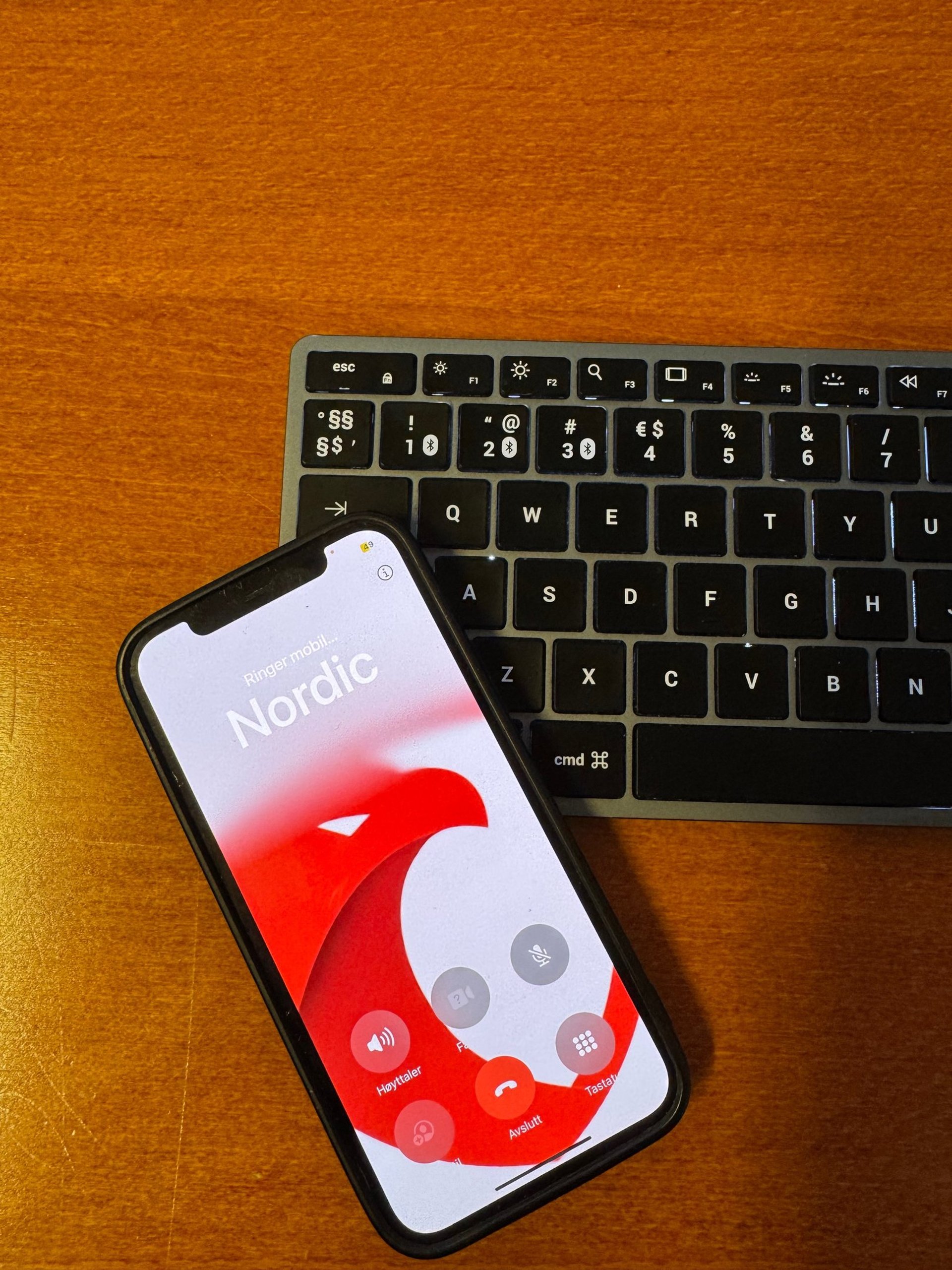 man using IP phone inside room